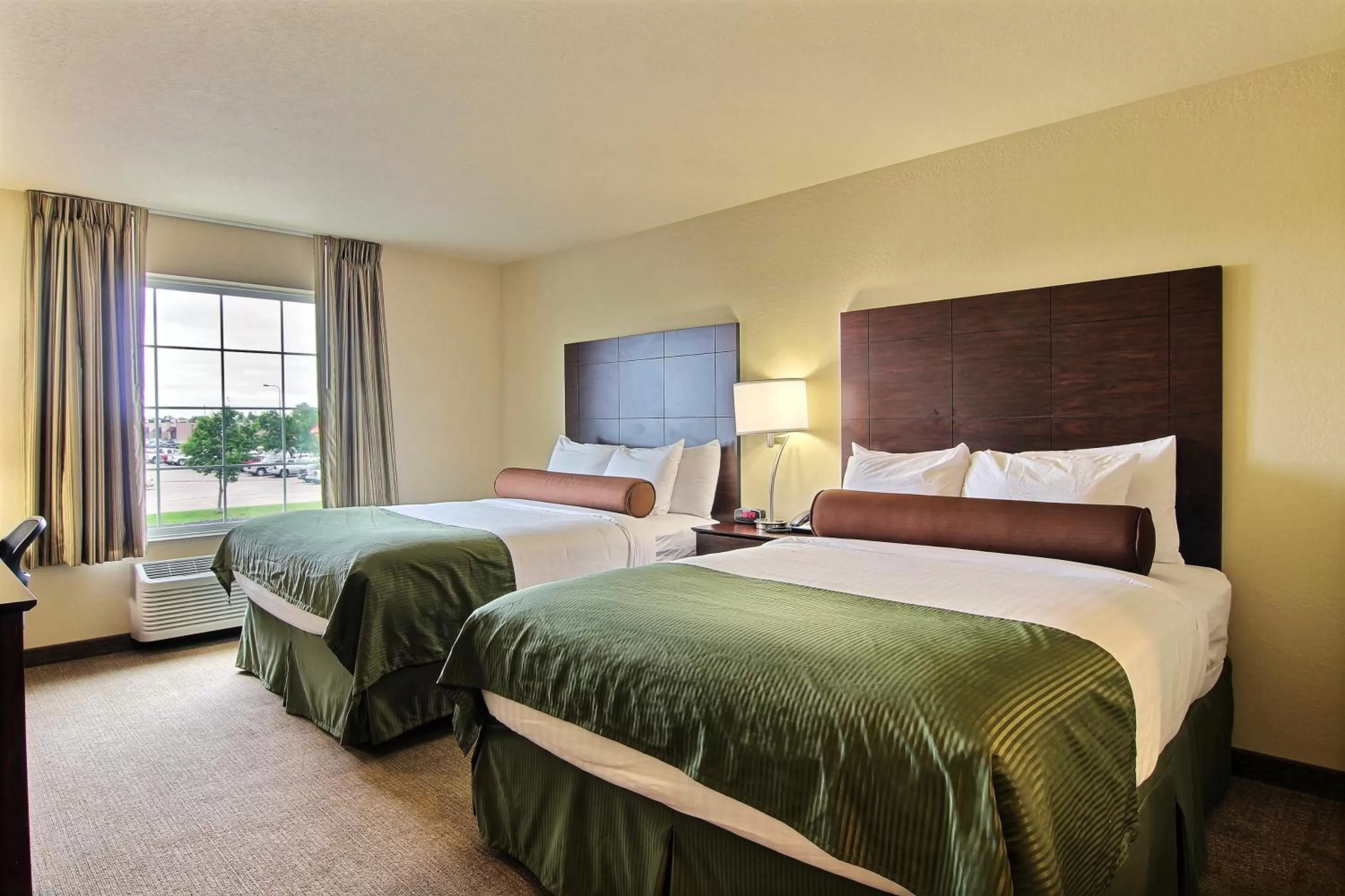 Bed in Cobblestone Hotel and Suites - Crookston