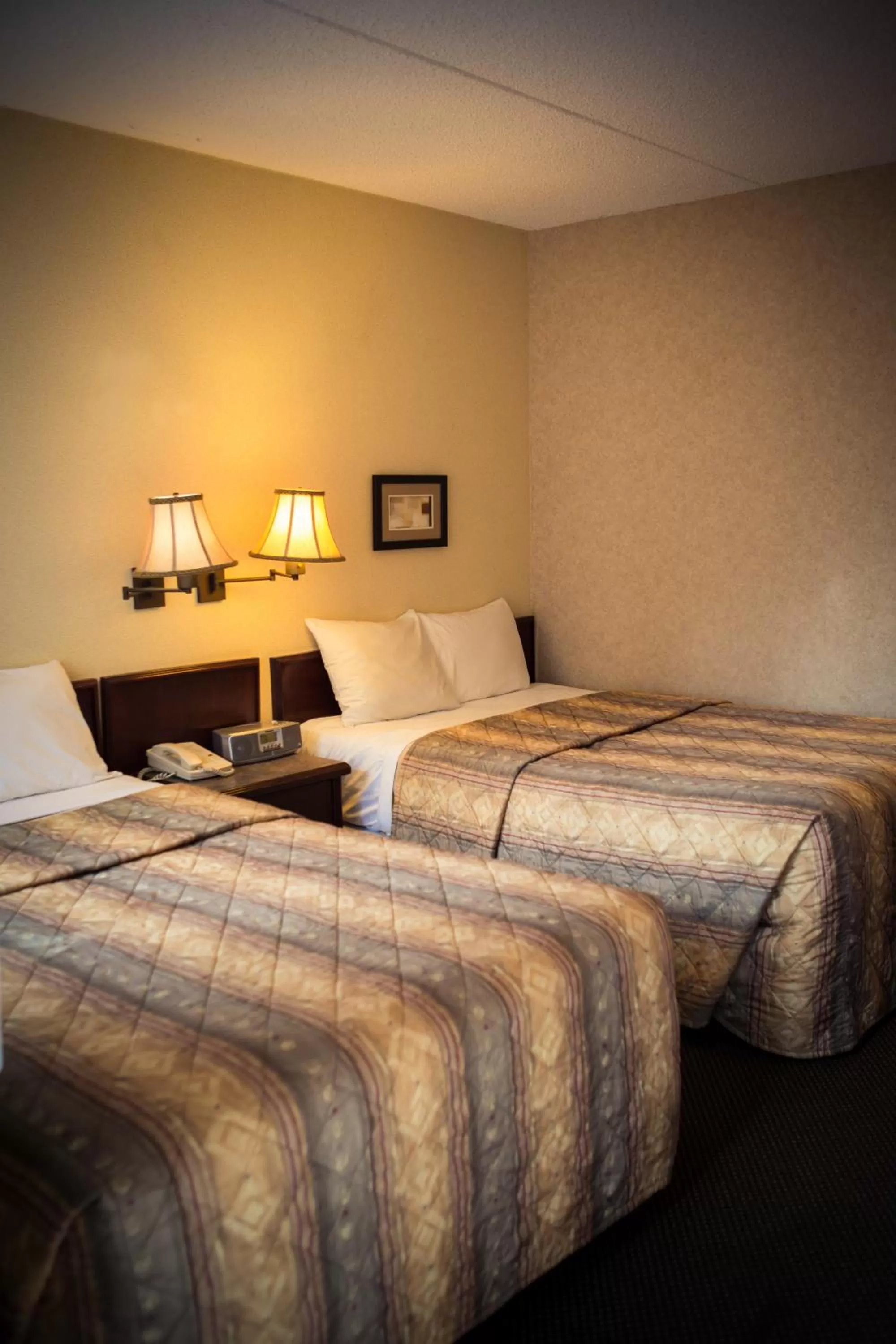 Photo of the whole room, Bed in Langley Hwy Hotel