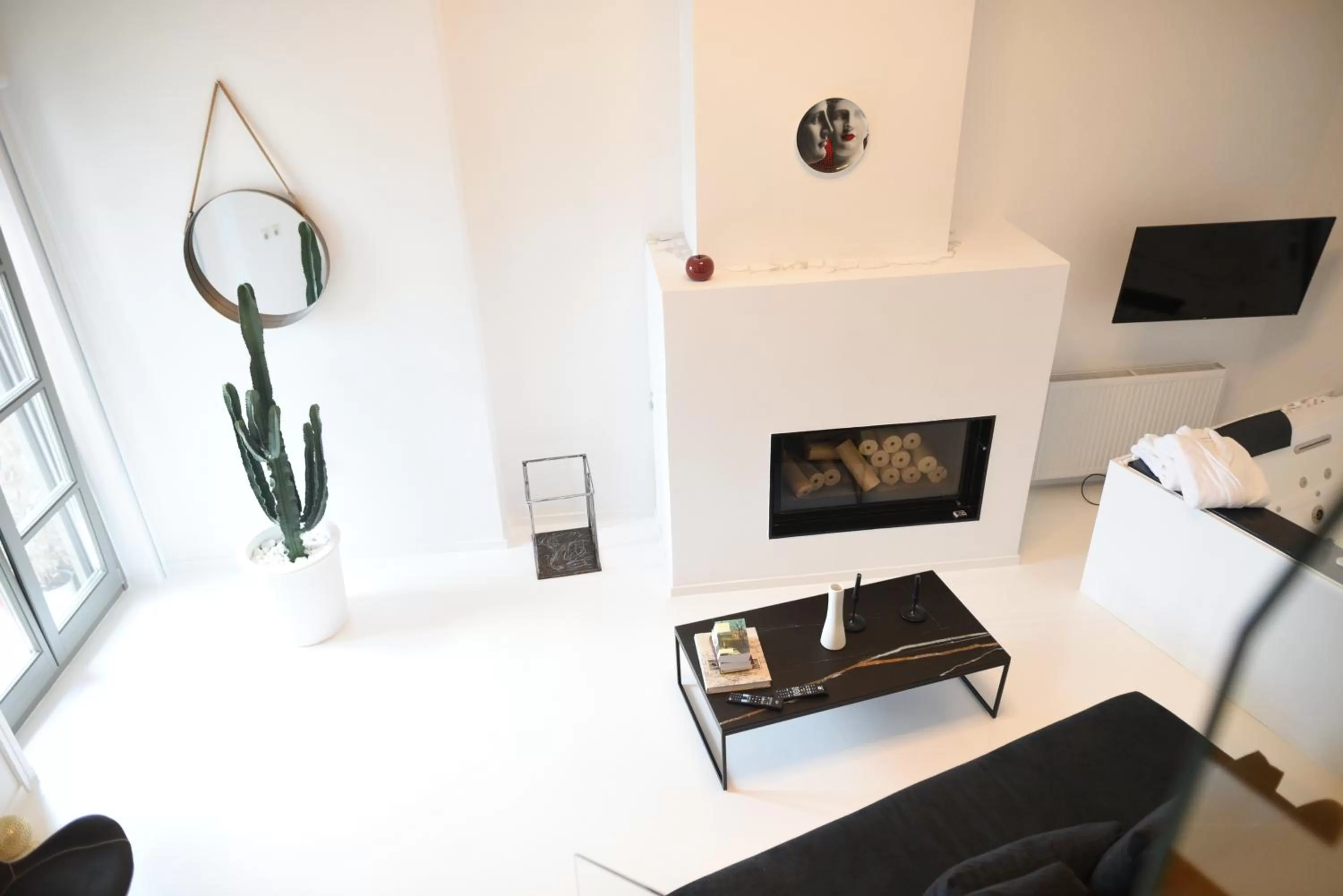 Property building, TV/Entertainment Center in Clocktower Luxury Suites