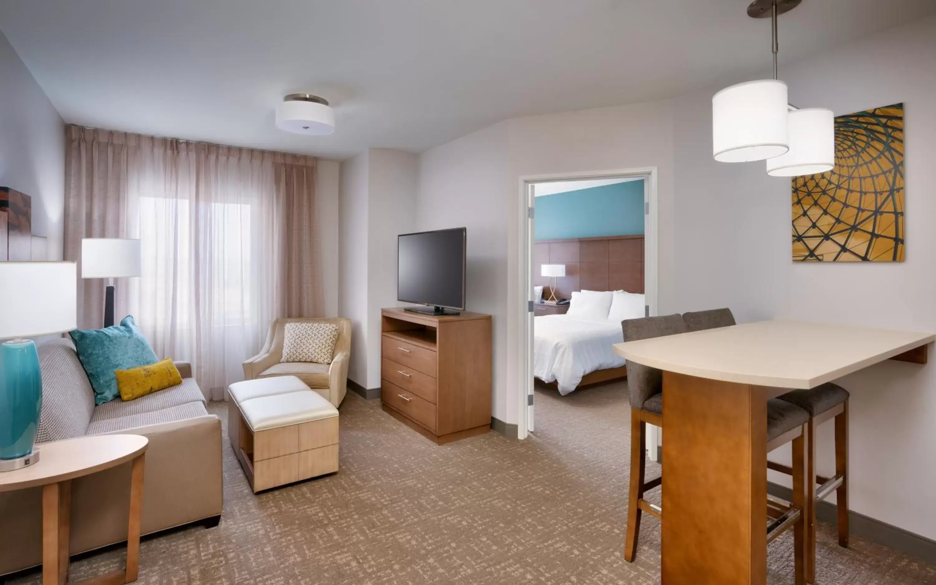 Photo of the whole room, TV/Entertainment Center in Staybridge Suites - Lehi - Traverse Ridge Center, an IHG Hotel