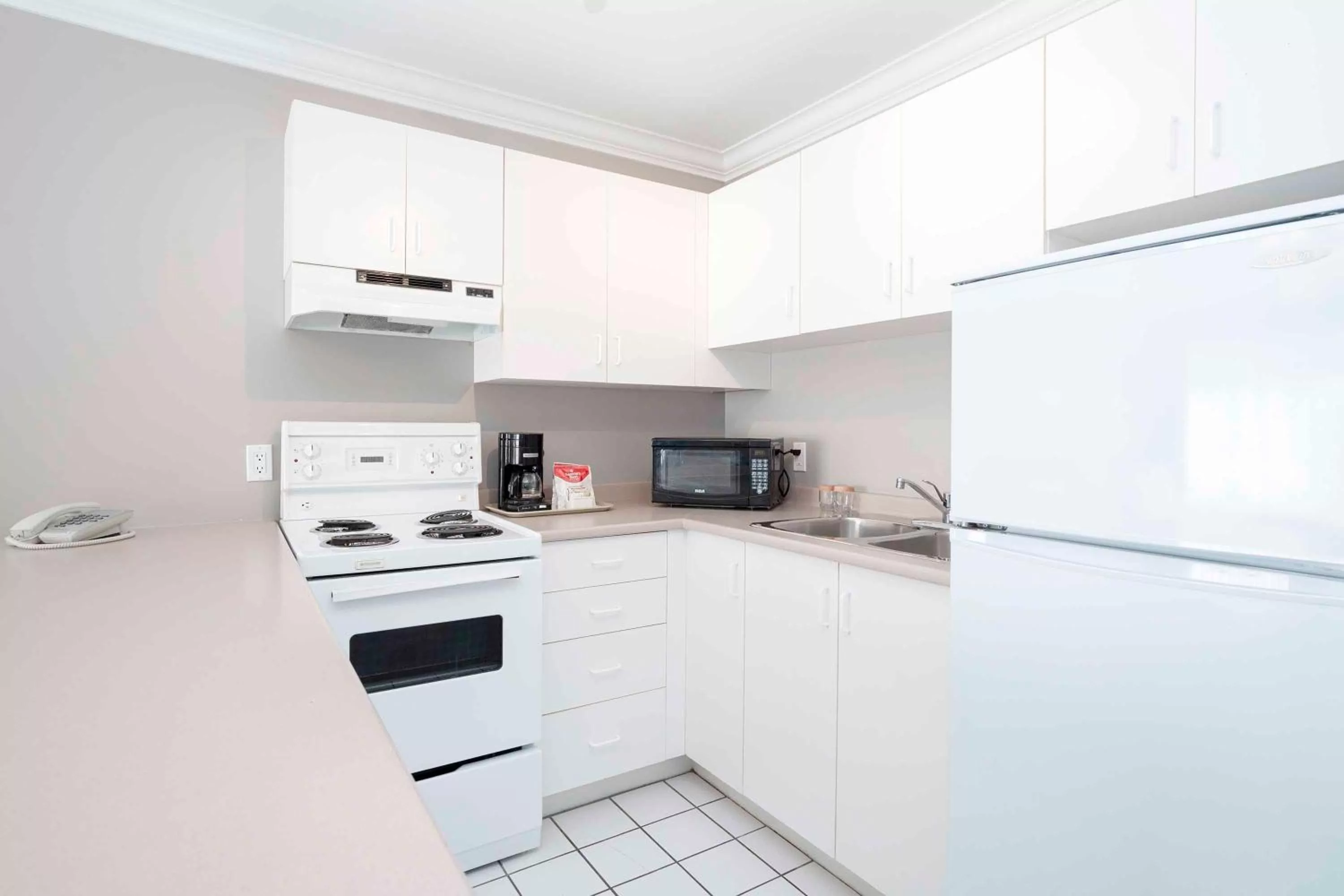 Kitchen or kitchenette in Sandman Hotel & Suites Prince George