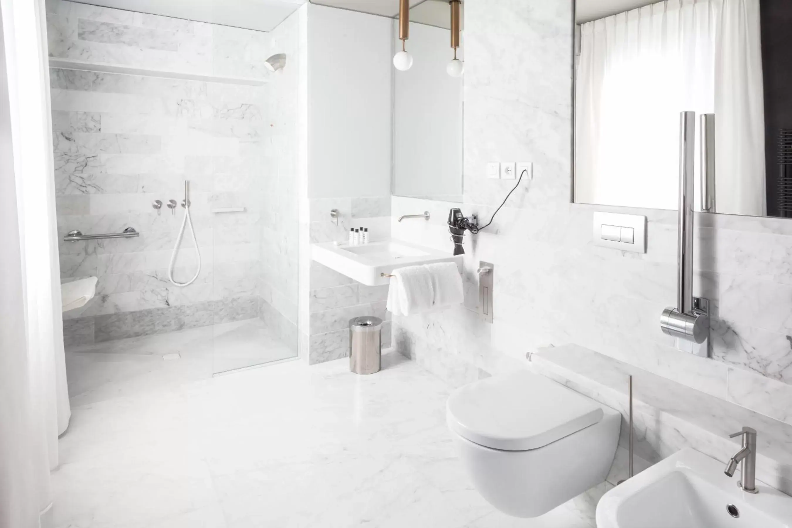 Bathroom in Senato Hotel Milano Bathroom in Senato Hotel Milano