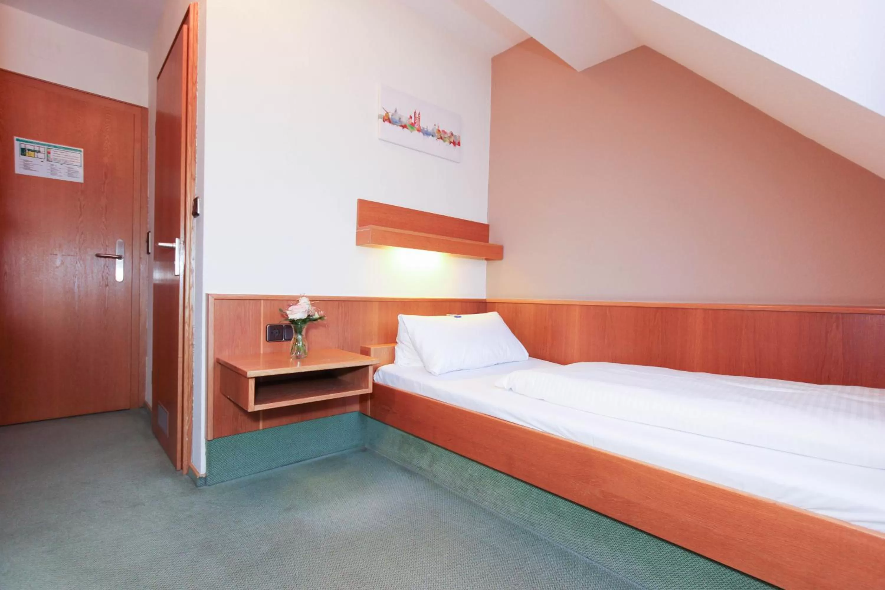 Bed in City Hotel Würzburg