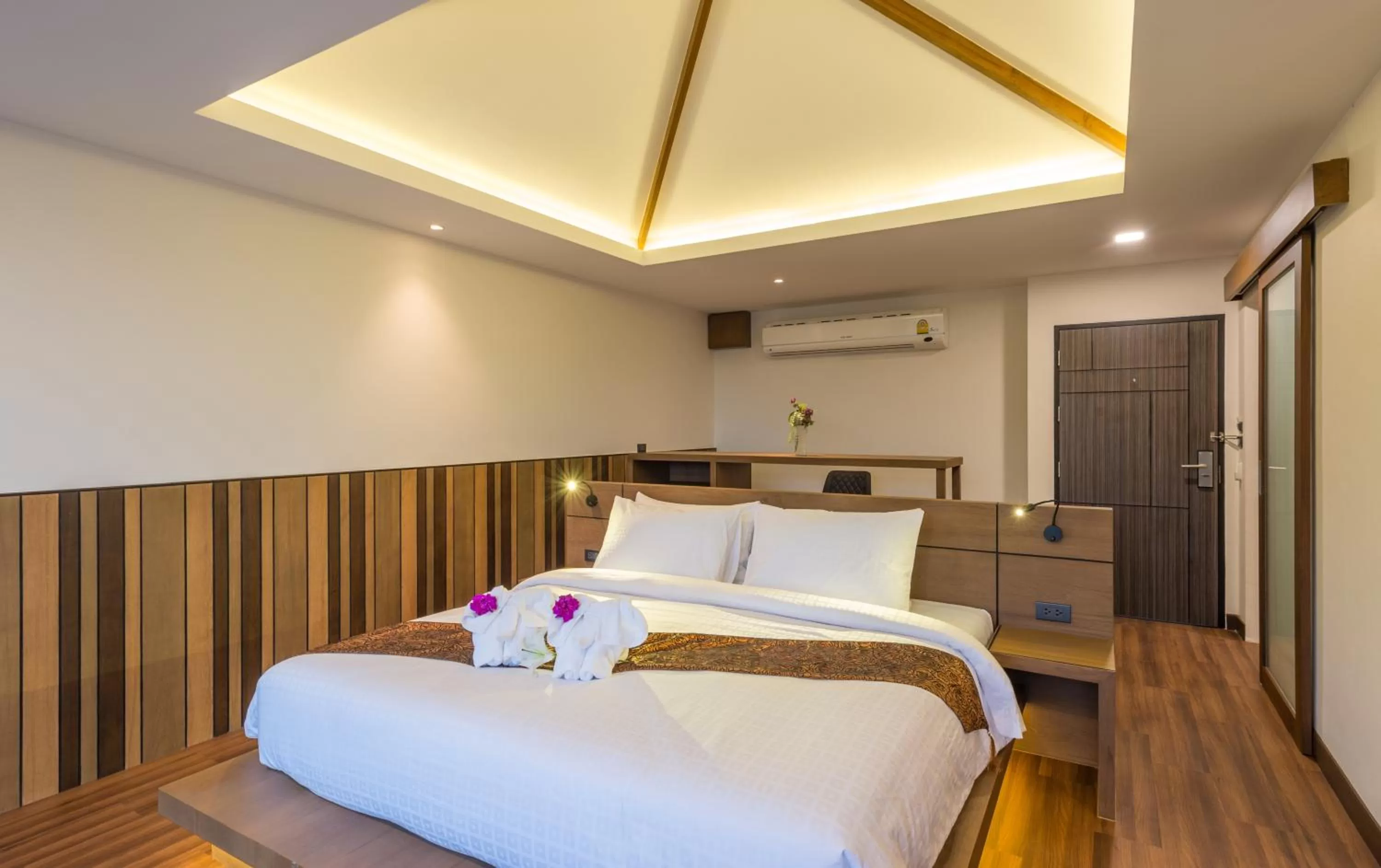 Bed in Cher​mantra​ Aonang​ Resort & Pool​ Suite