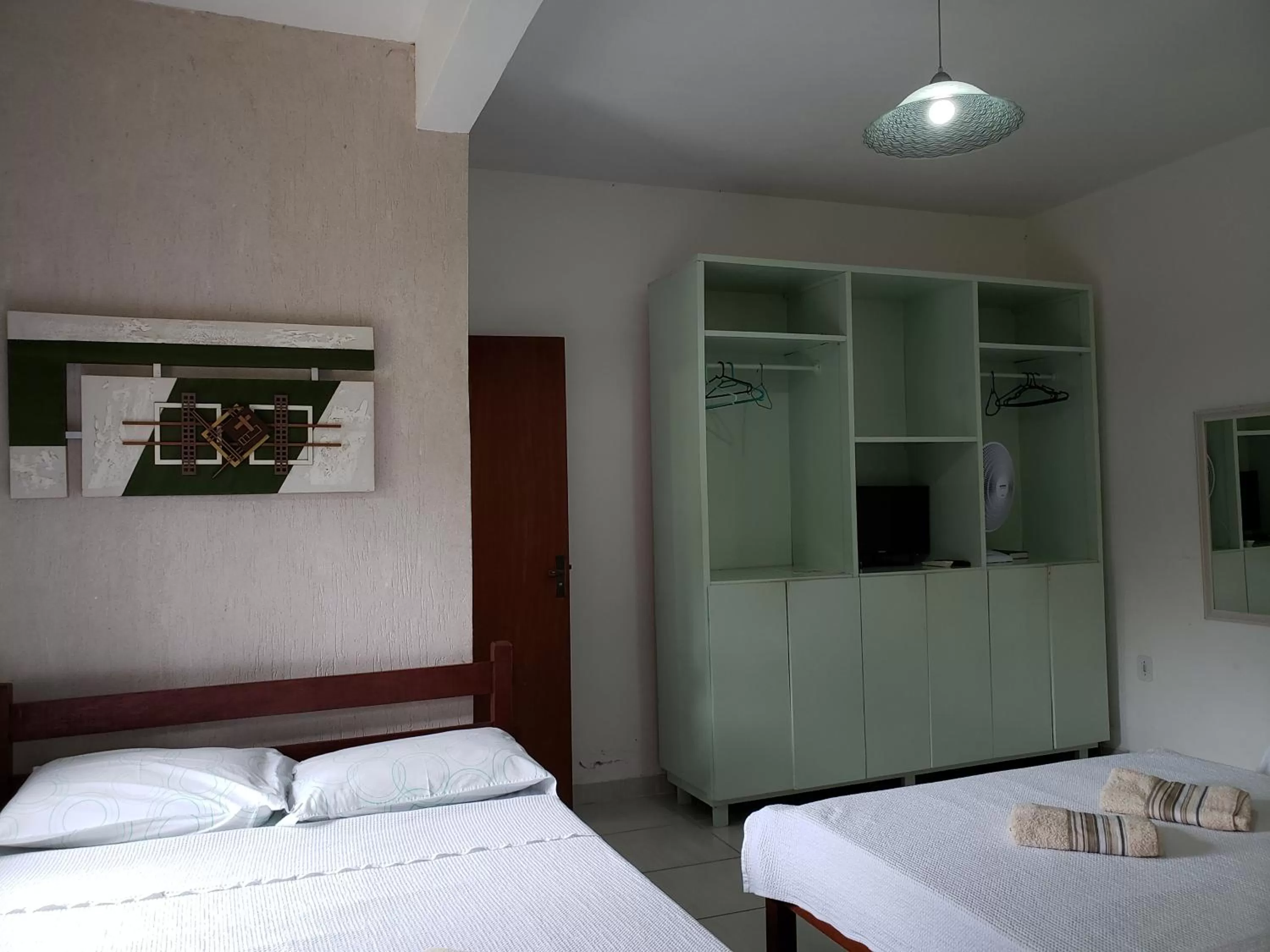 Bed in Pousada Recanto Das Emerências