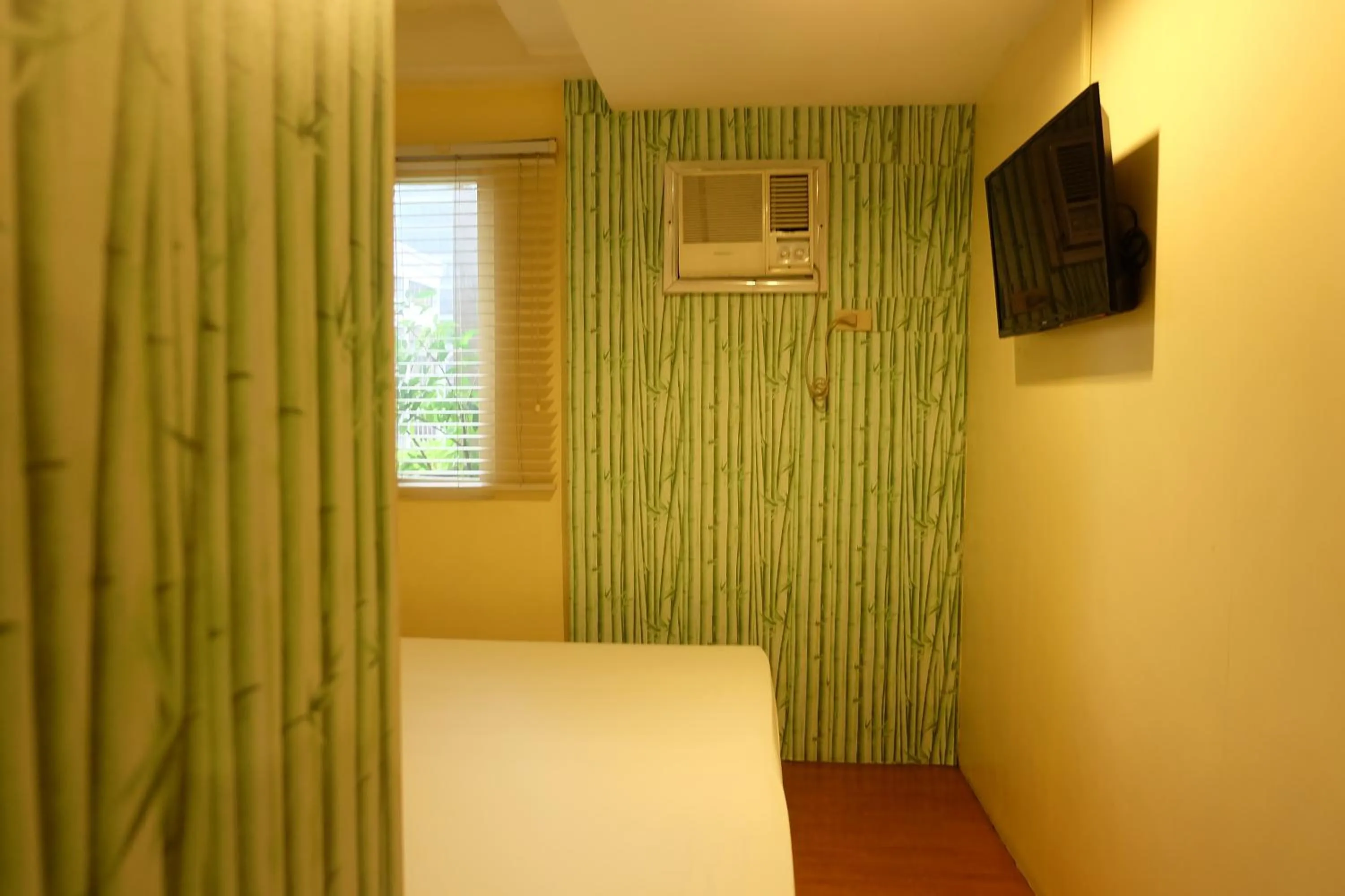 Bedroom in Spaces Hotel Makati