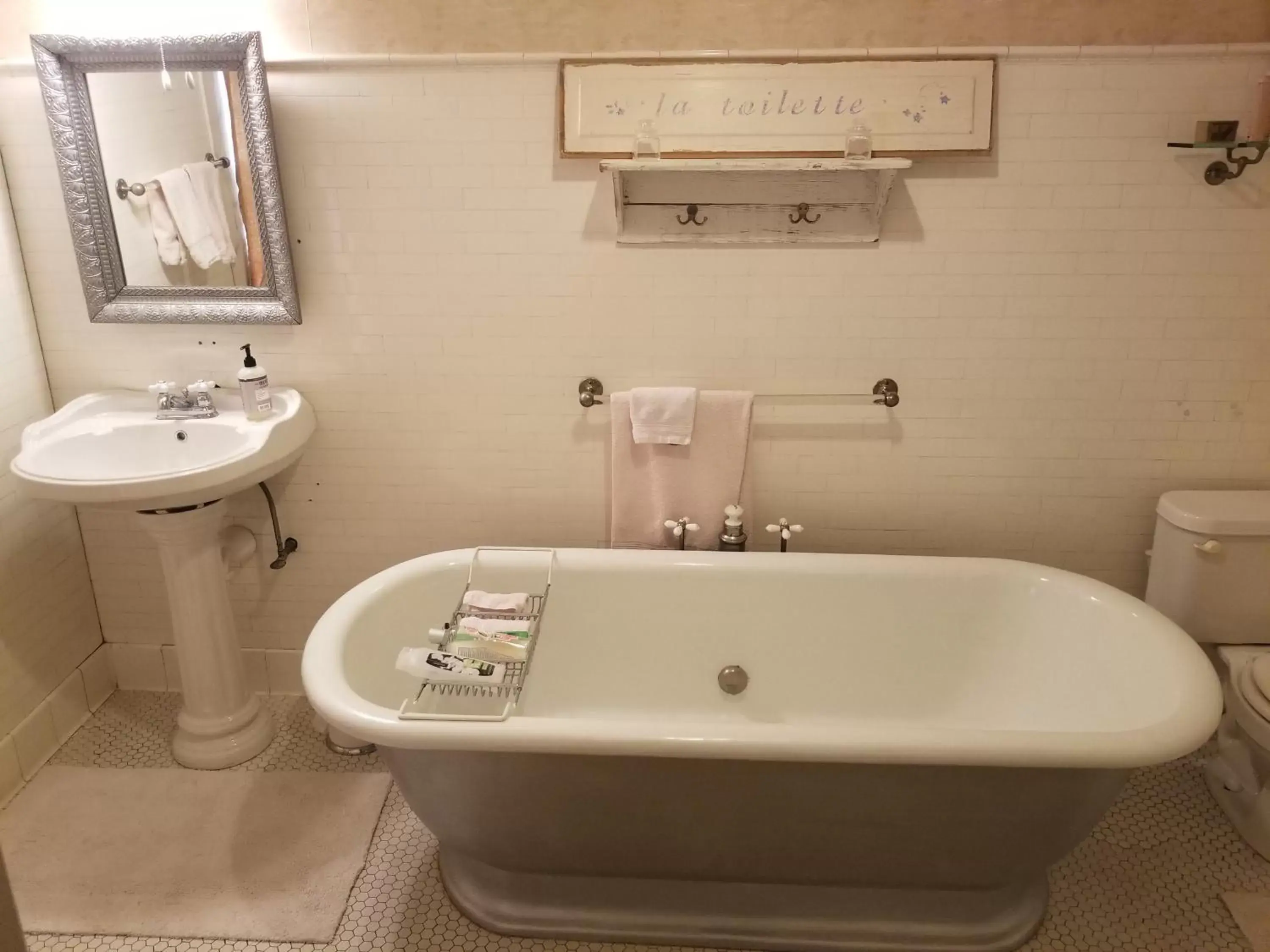 Toilet, Bathroom in Historic Victorian Inn