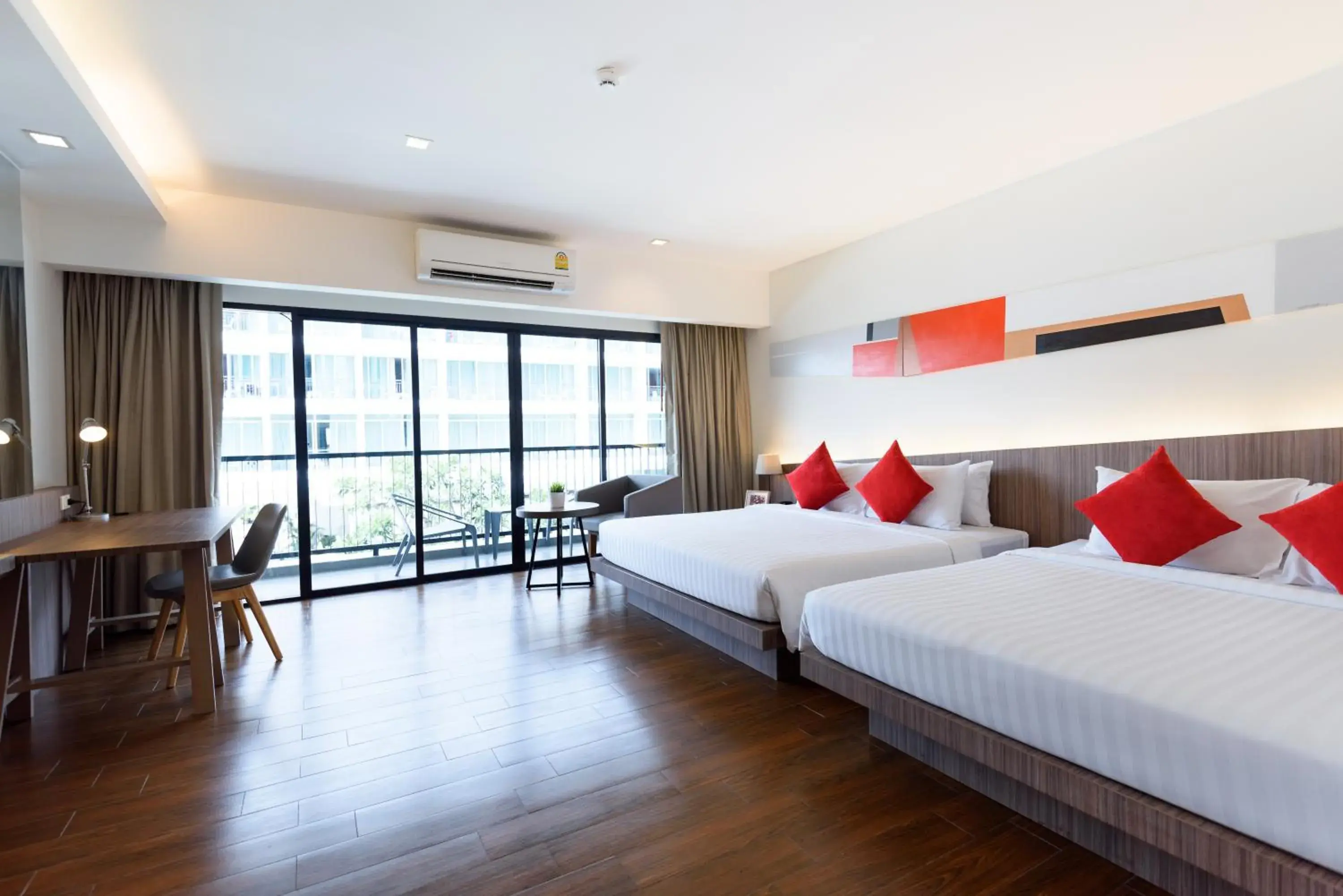 Photo of the whole room in J Inspired Hotel Pattaya (SHA Plus)