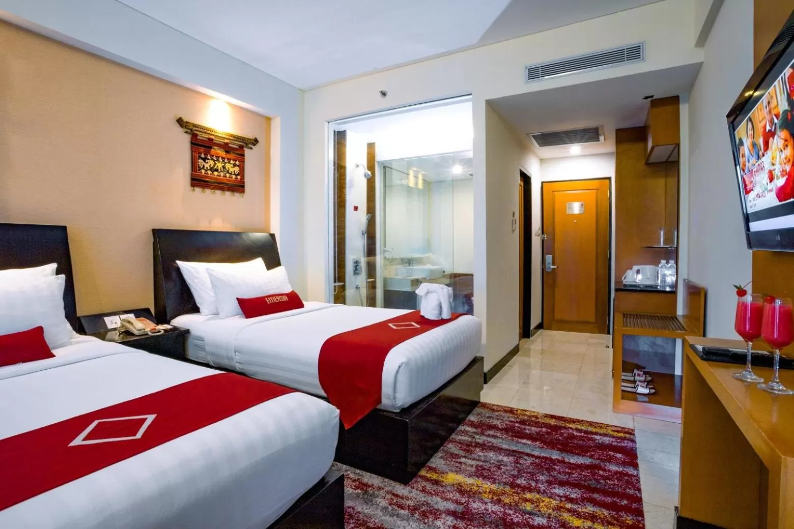 Bed in Emersia Hotel and Resort