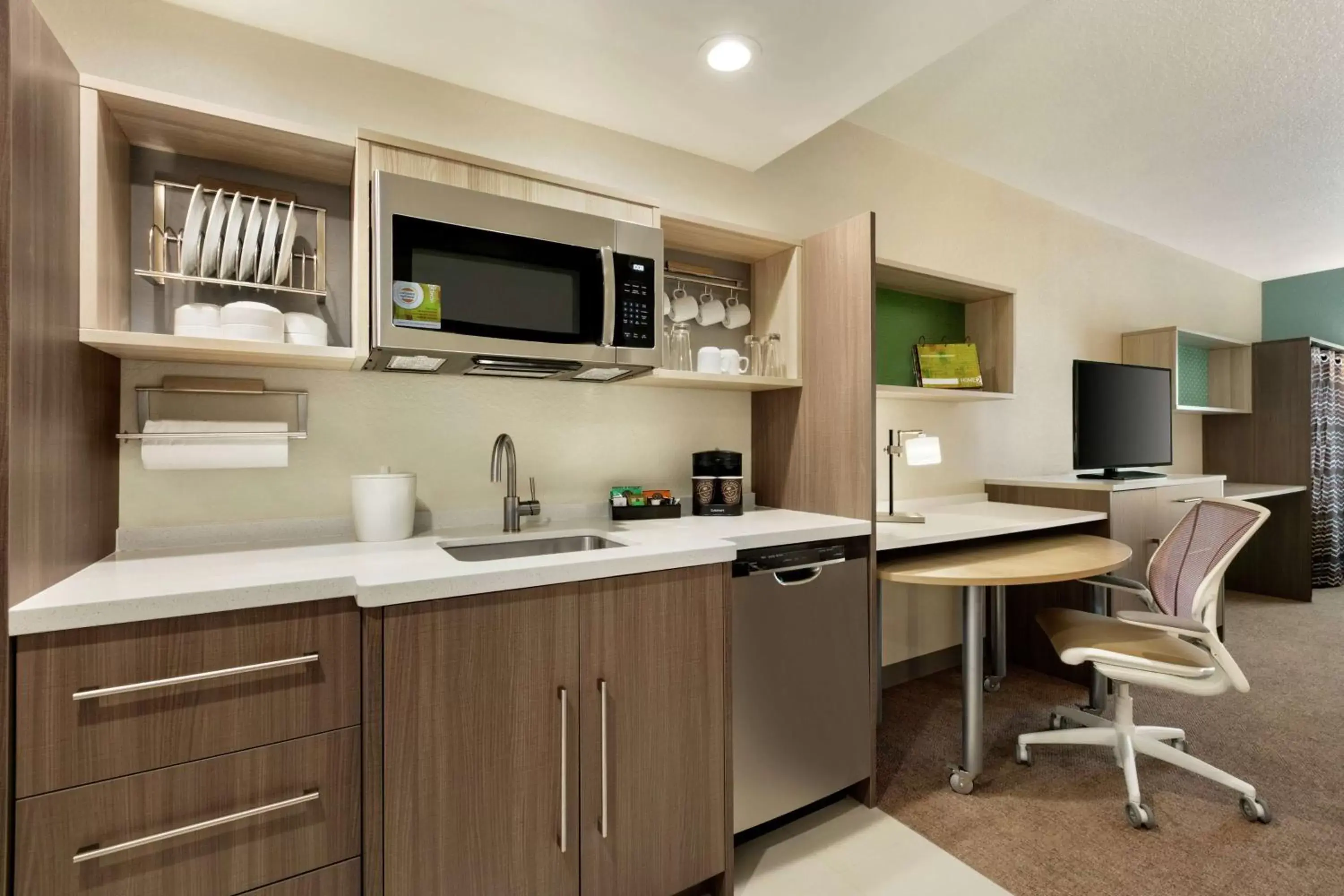Bedroom, Kitchen/Kitchenette in Home2 Suites By Hilton Orlando South Park