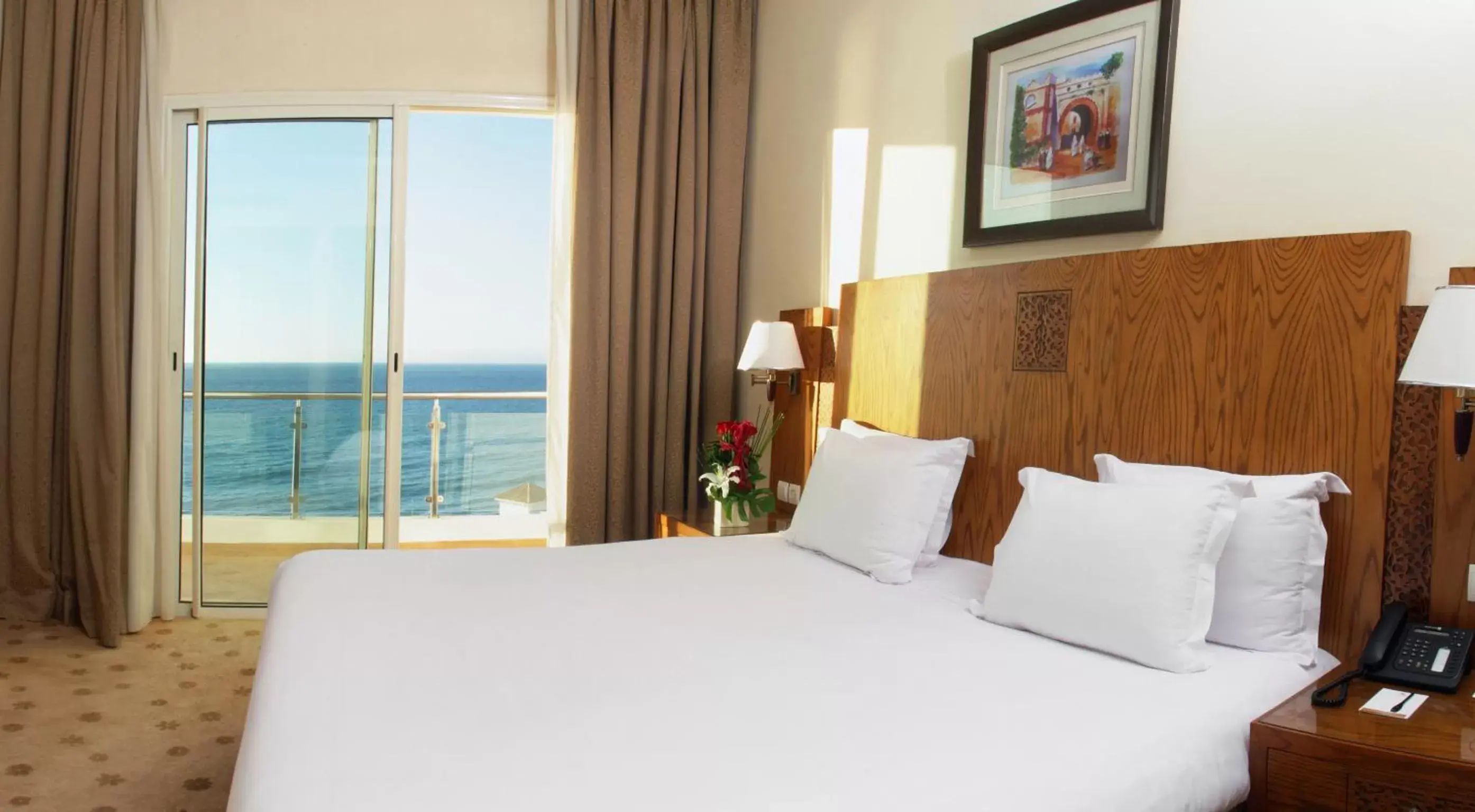 Bedroom, Bed in Grand Mogador Sea View & Spa