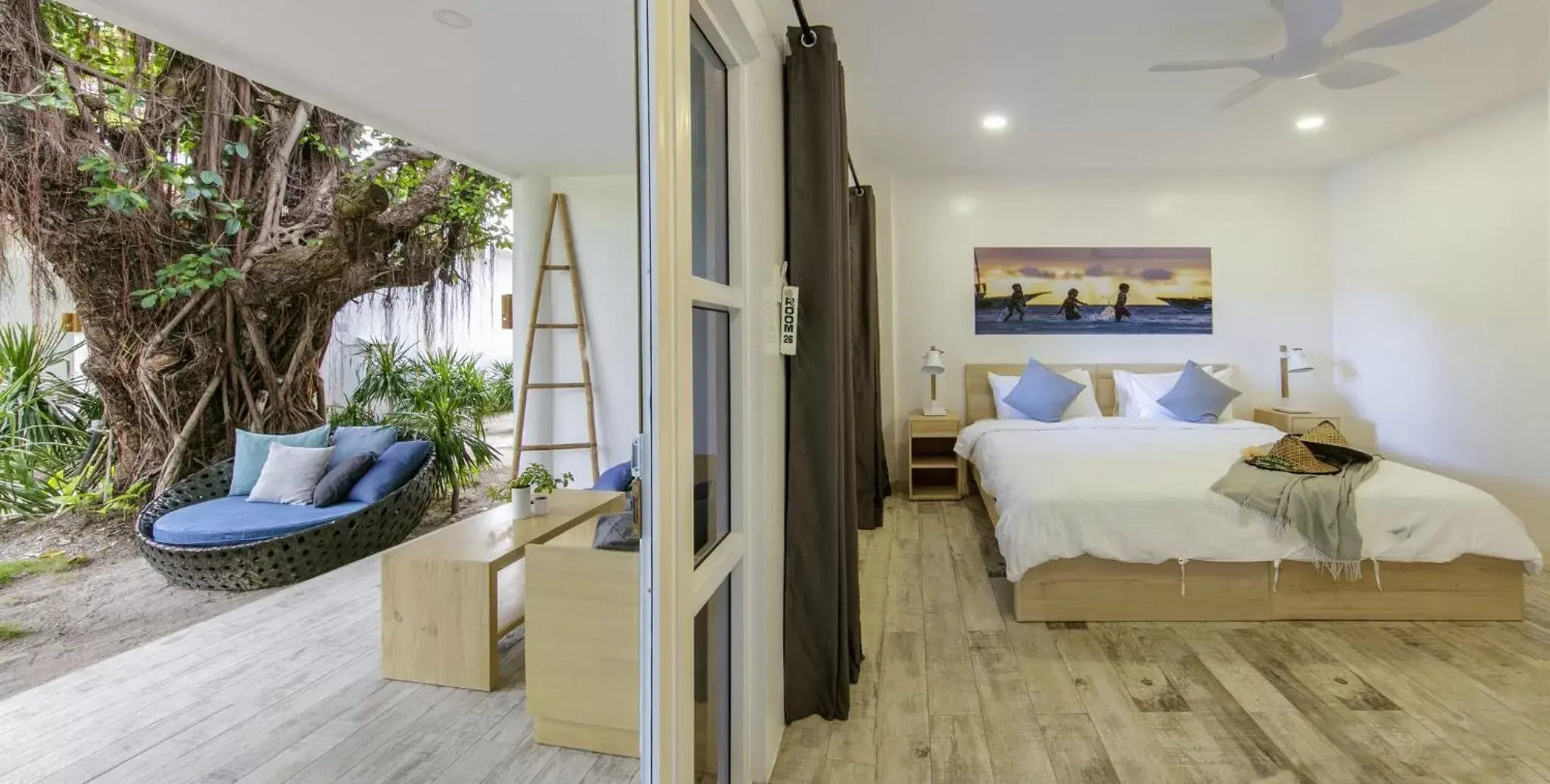 Patio, Bed in Ocean Vida Beach and Dive Resort Patio, Bed in Ocean Vida Beach and Dive Resort