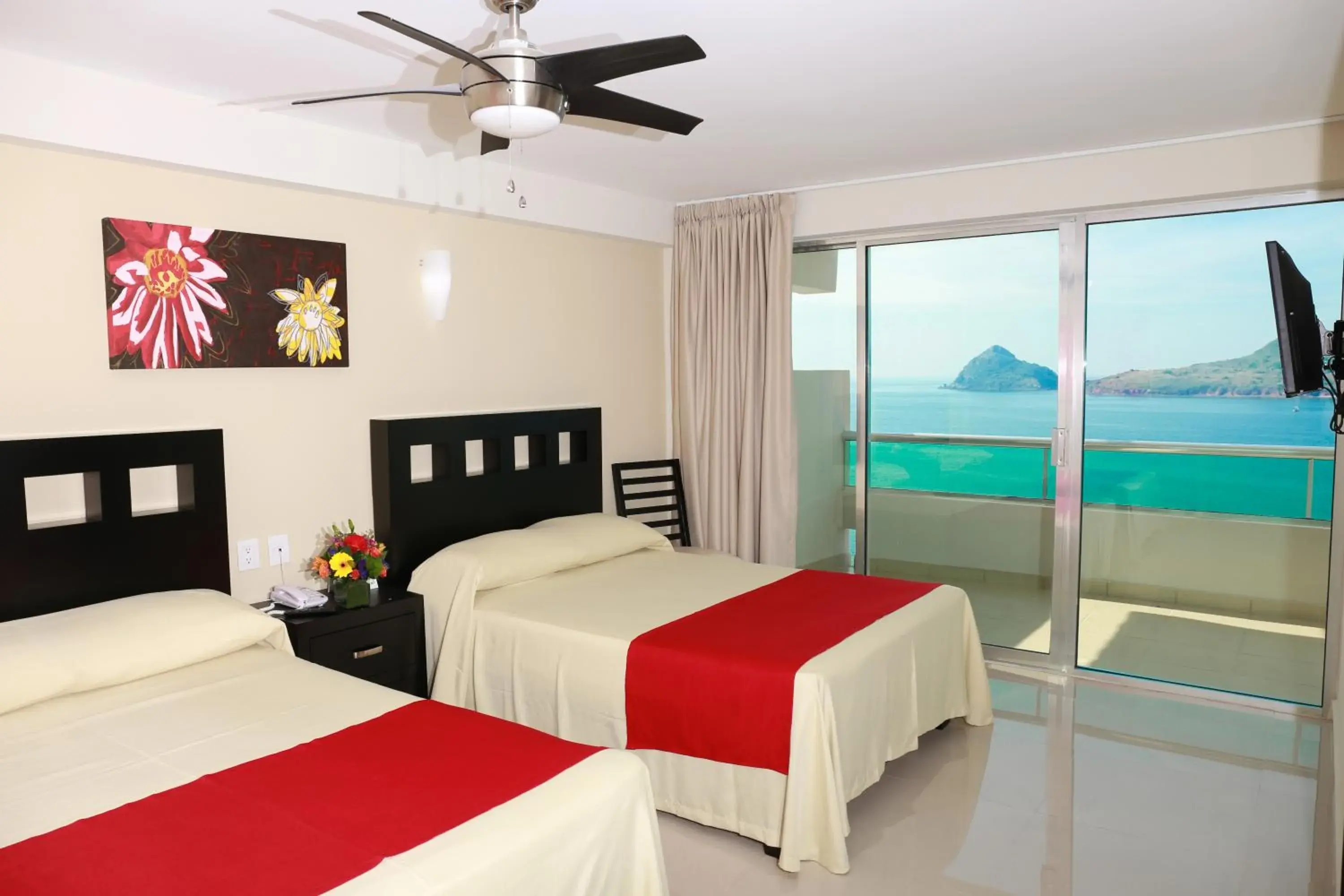 Photo of the whole room, Bed in Las Flores Beach Resort Photo of the whole room, Bed in Las Flores Beach Resort