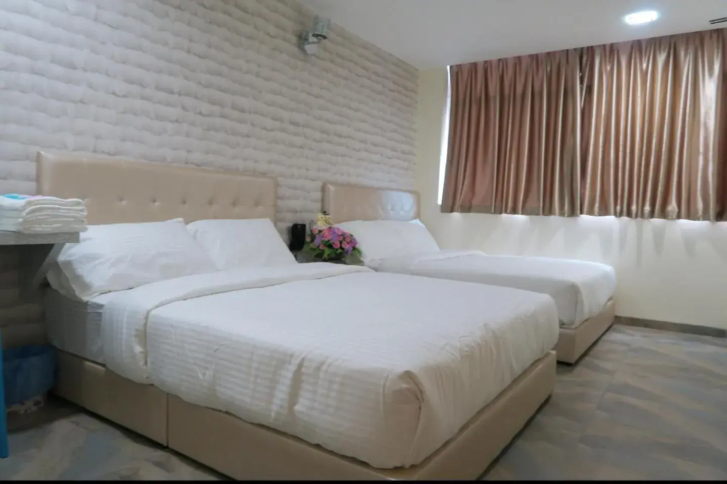 Bed in 888 Boutique Hotel