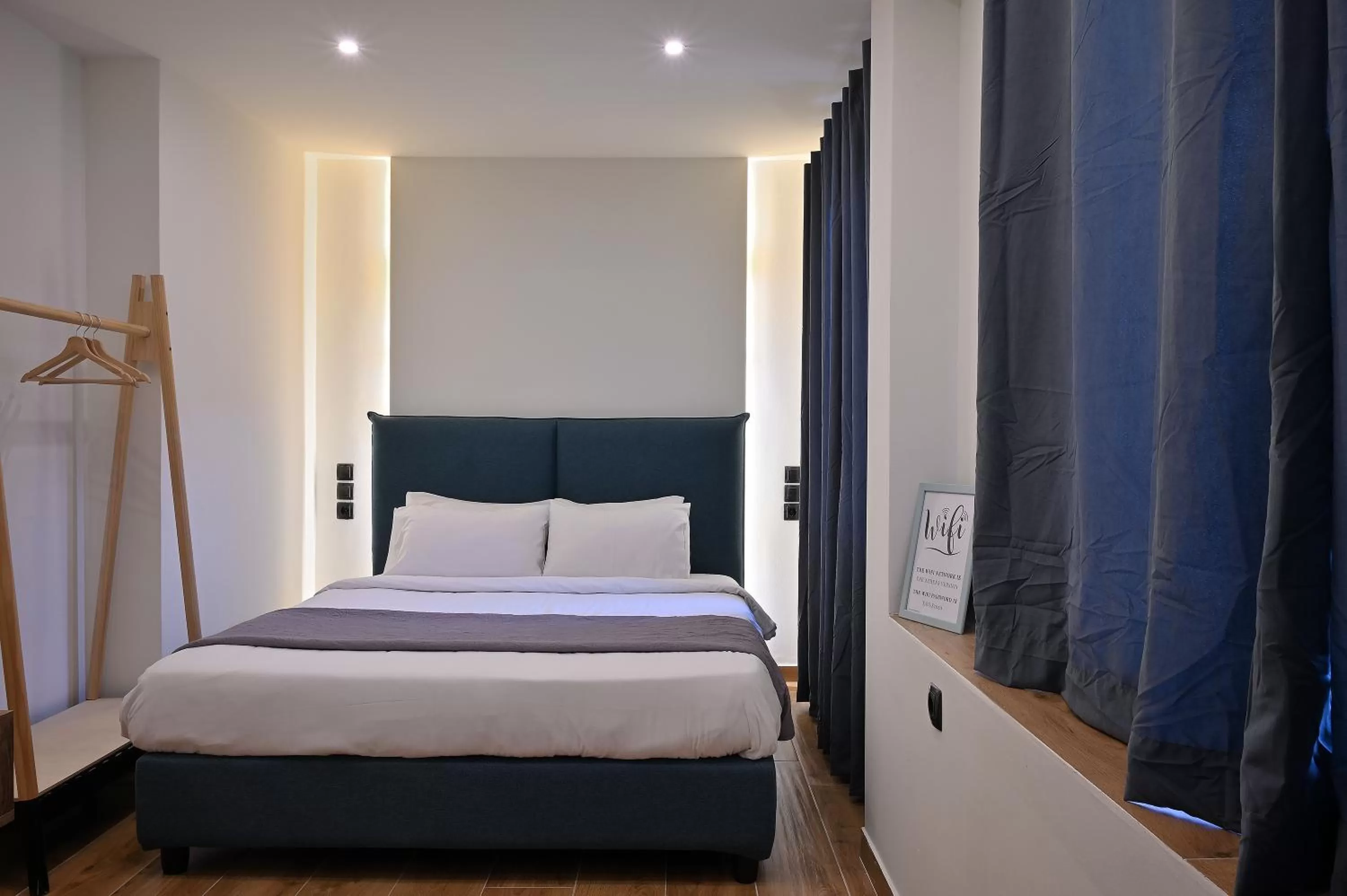 Bed in The Athens Version Luxury Suites