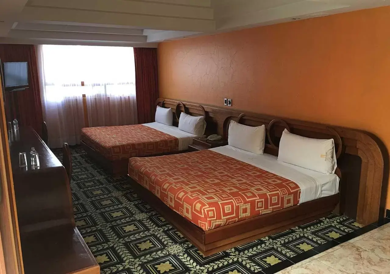 Bed in Hotel Escala Siglo XXI