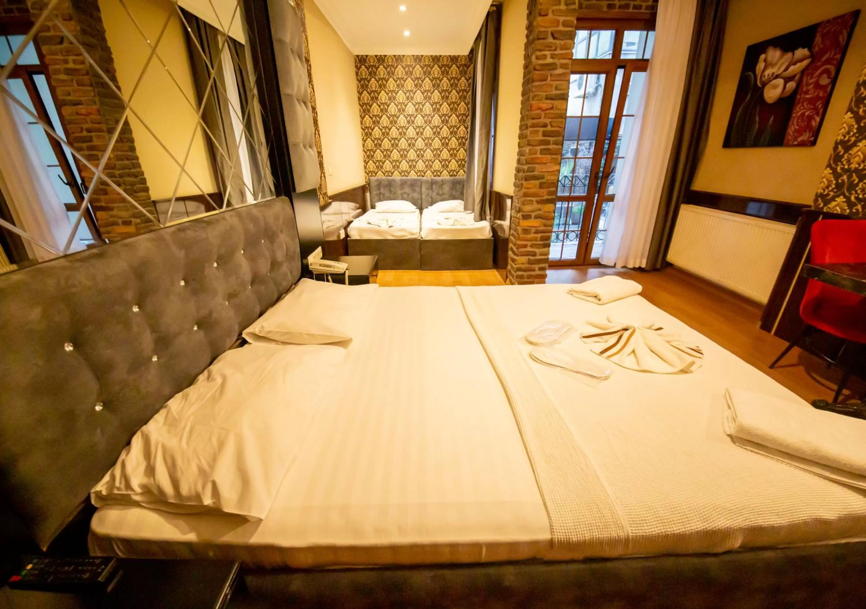 Bed in Royal Palace Hotel