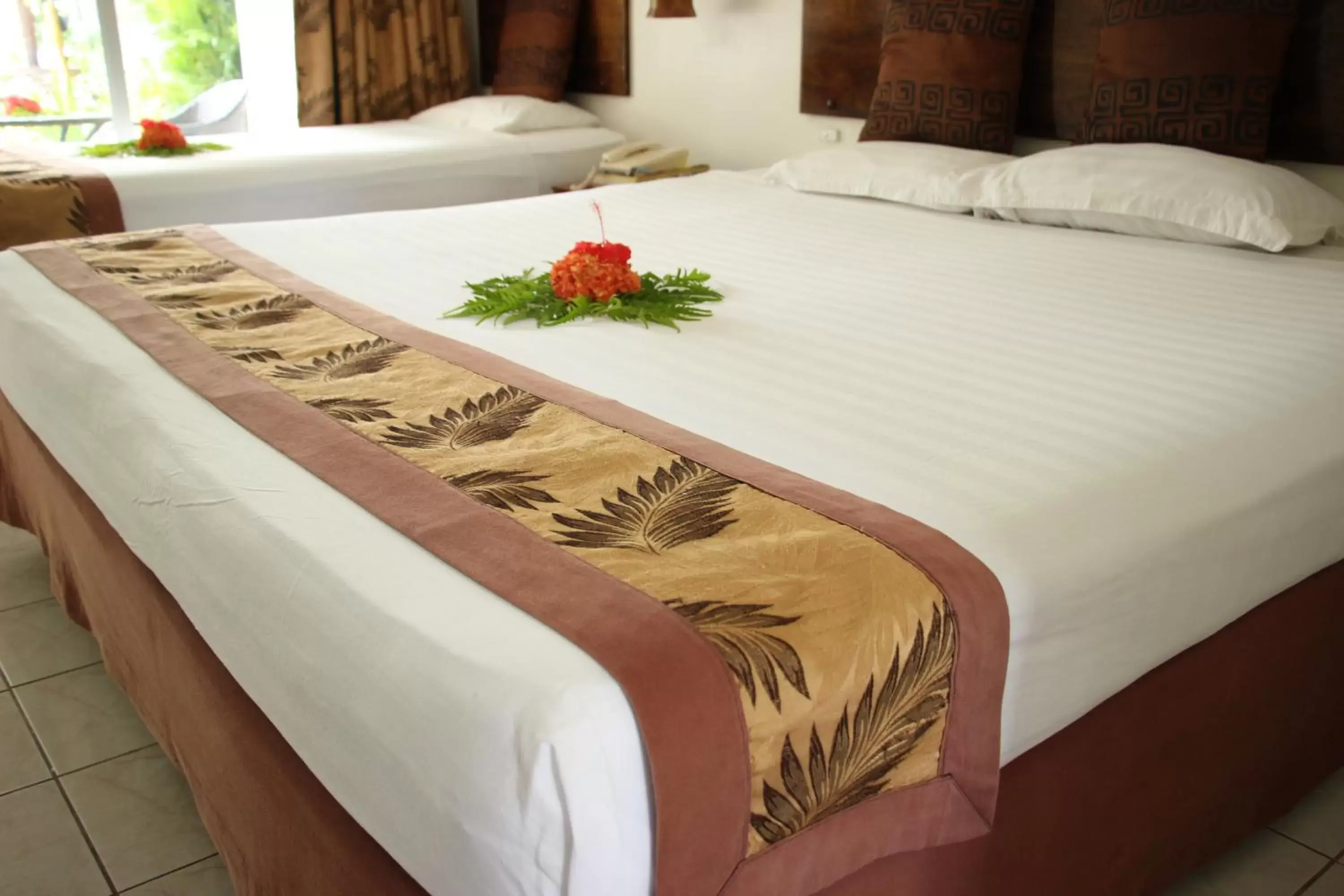 Bed in Capricorn International Hotel
