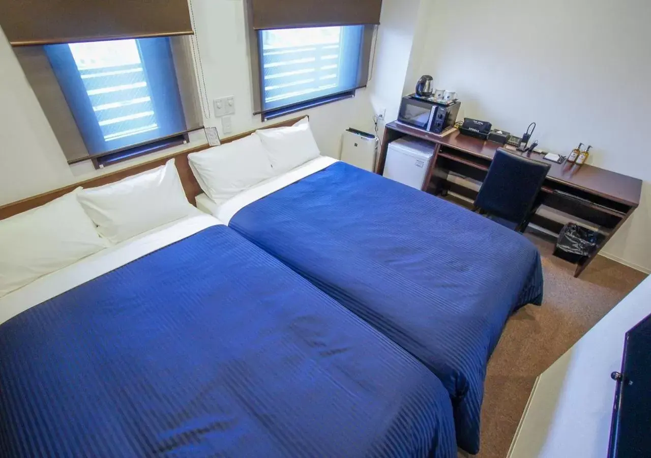 Photo of the whole room, Bed in HOTEL LiVEMAX Kanazawa Ekimae
