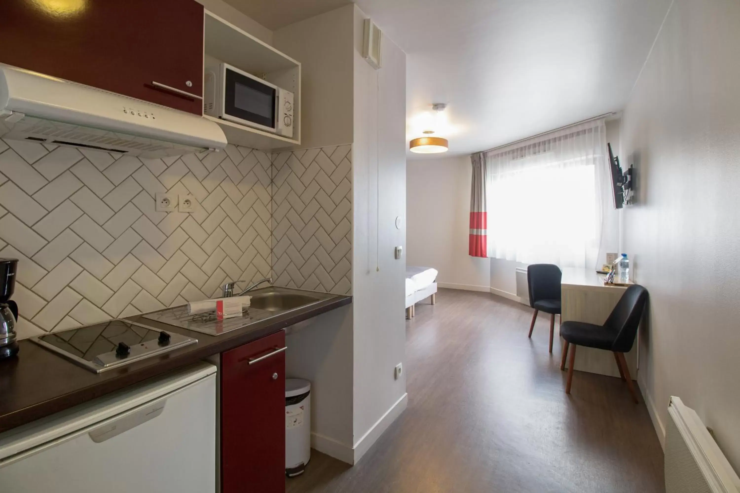 Kitchen or kitchenette, Kitchen/Kitchenette in Appart'City Confort Paris Villejuif (Ex Park&Suites)