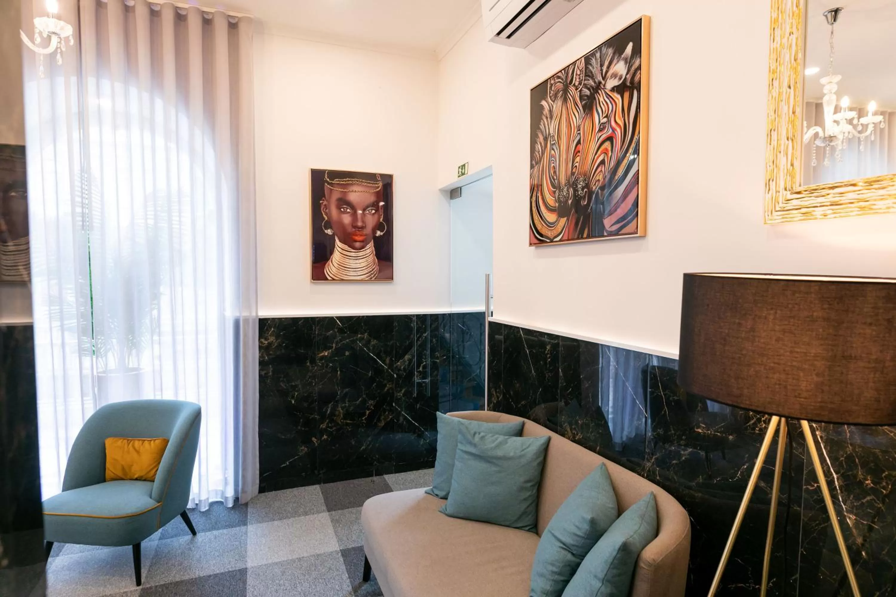 Seating area in Lisboa 85 Suites & Apartments by RIDAN Hotels