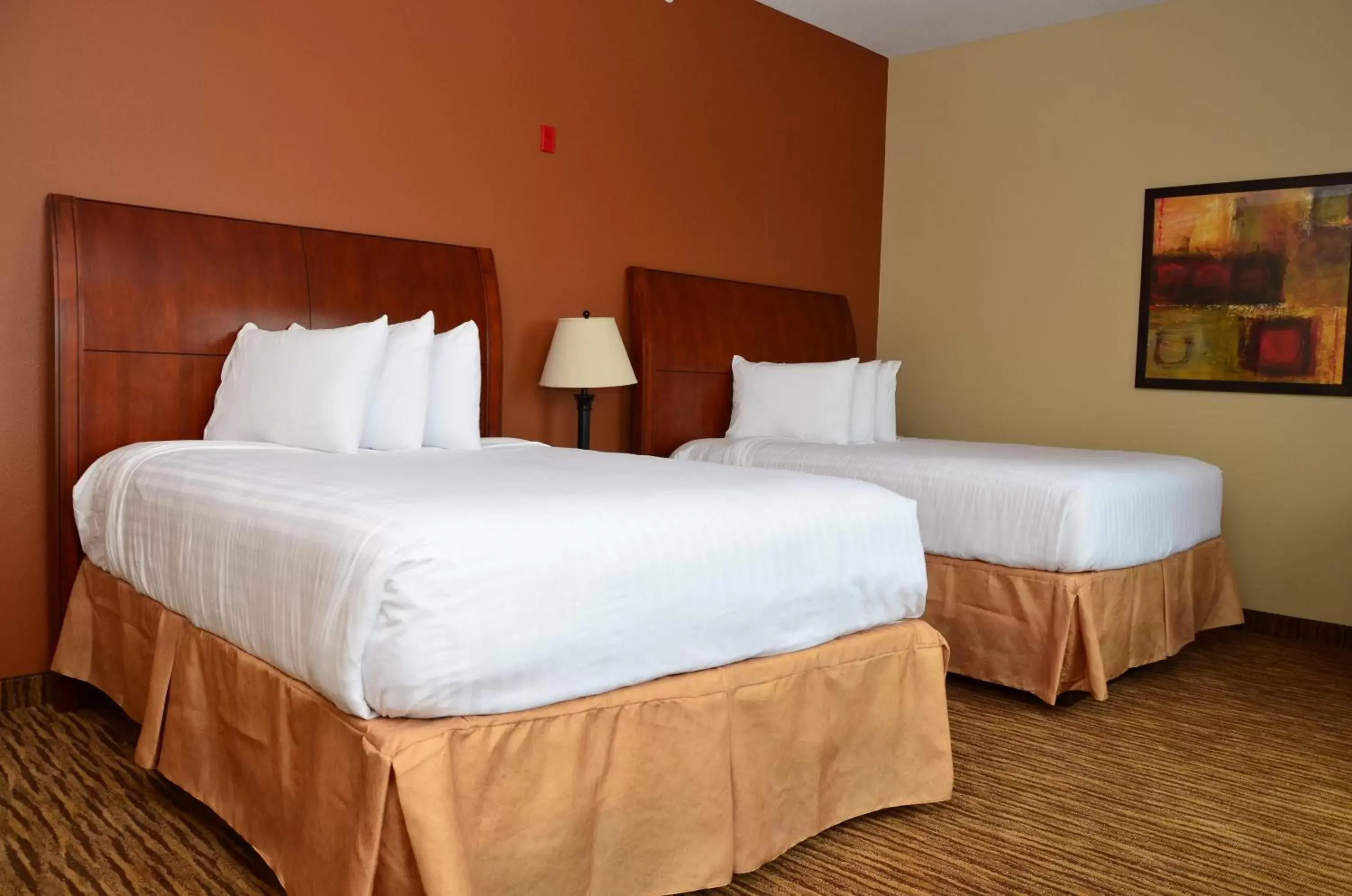 Bed in Cobblestone Inn & Suites - Newton