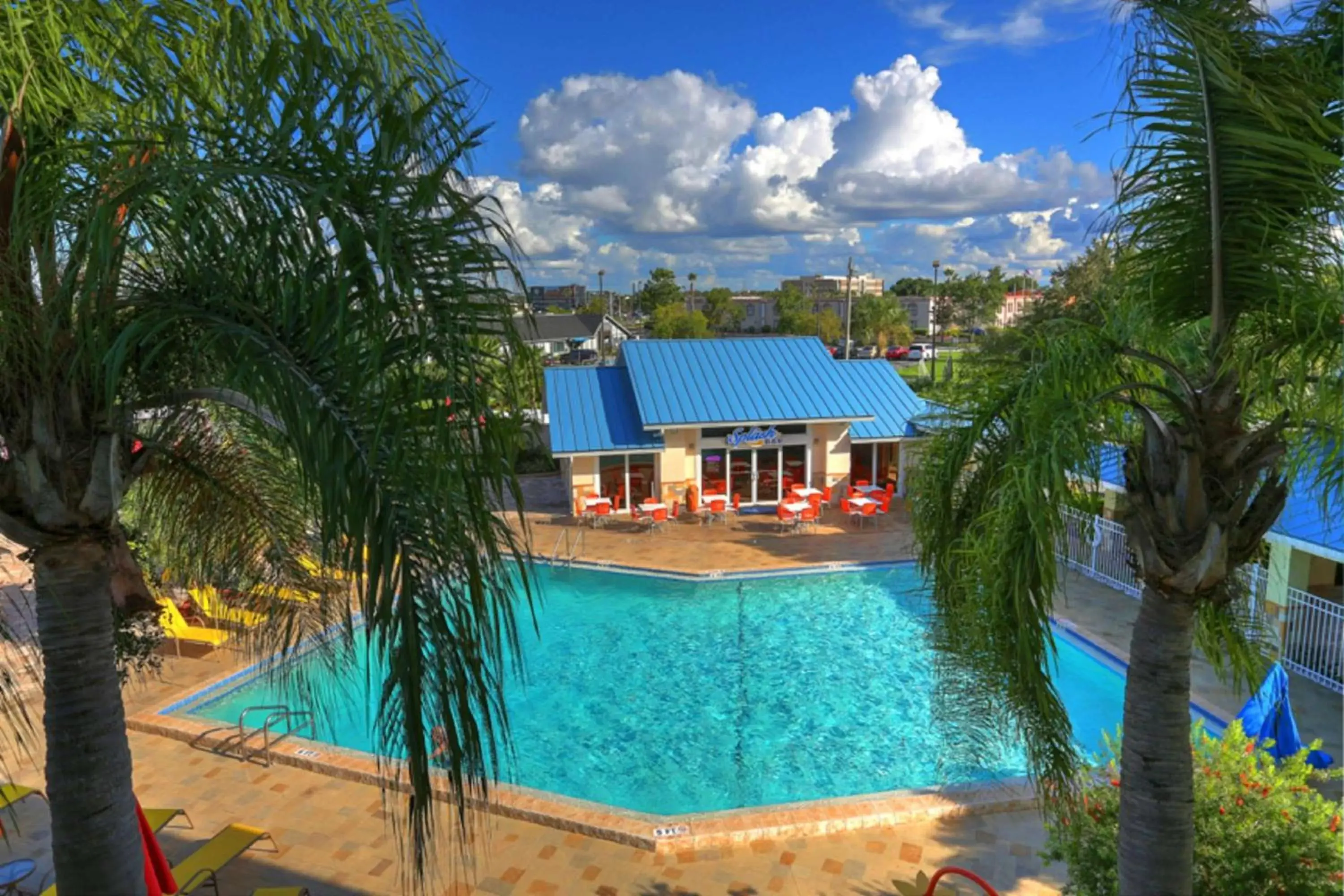 Restaurant/places to eat, Pool View in SureStay Plus by Best Western Orlando International Drive