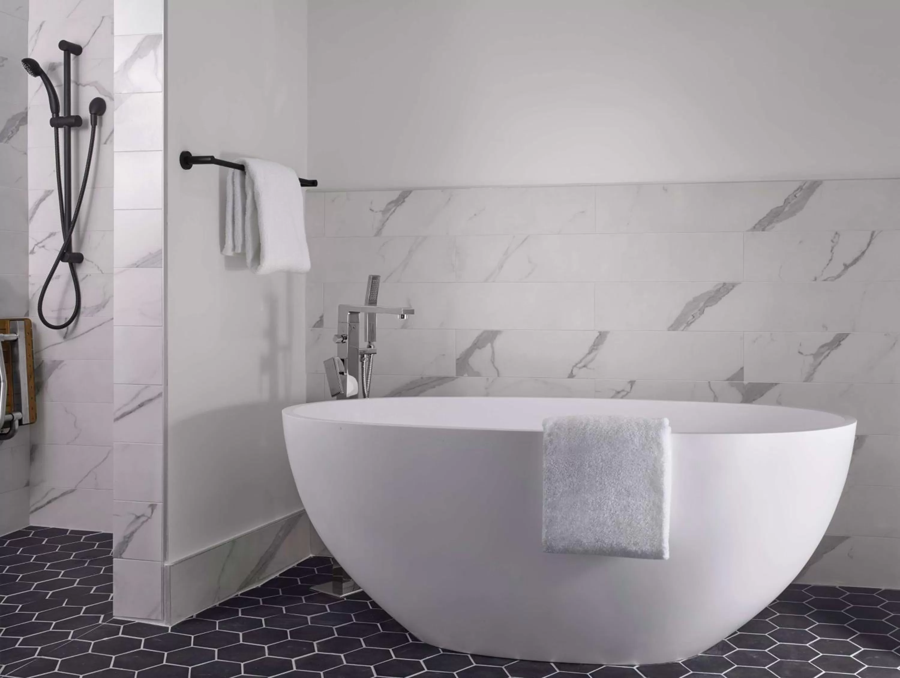 Bathroom in C. Baldwin, Curio Collection by Hilton