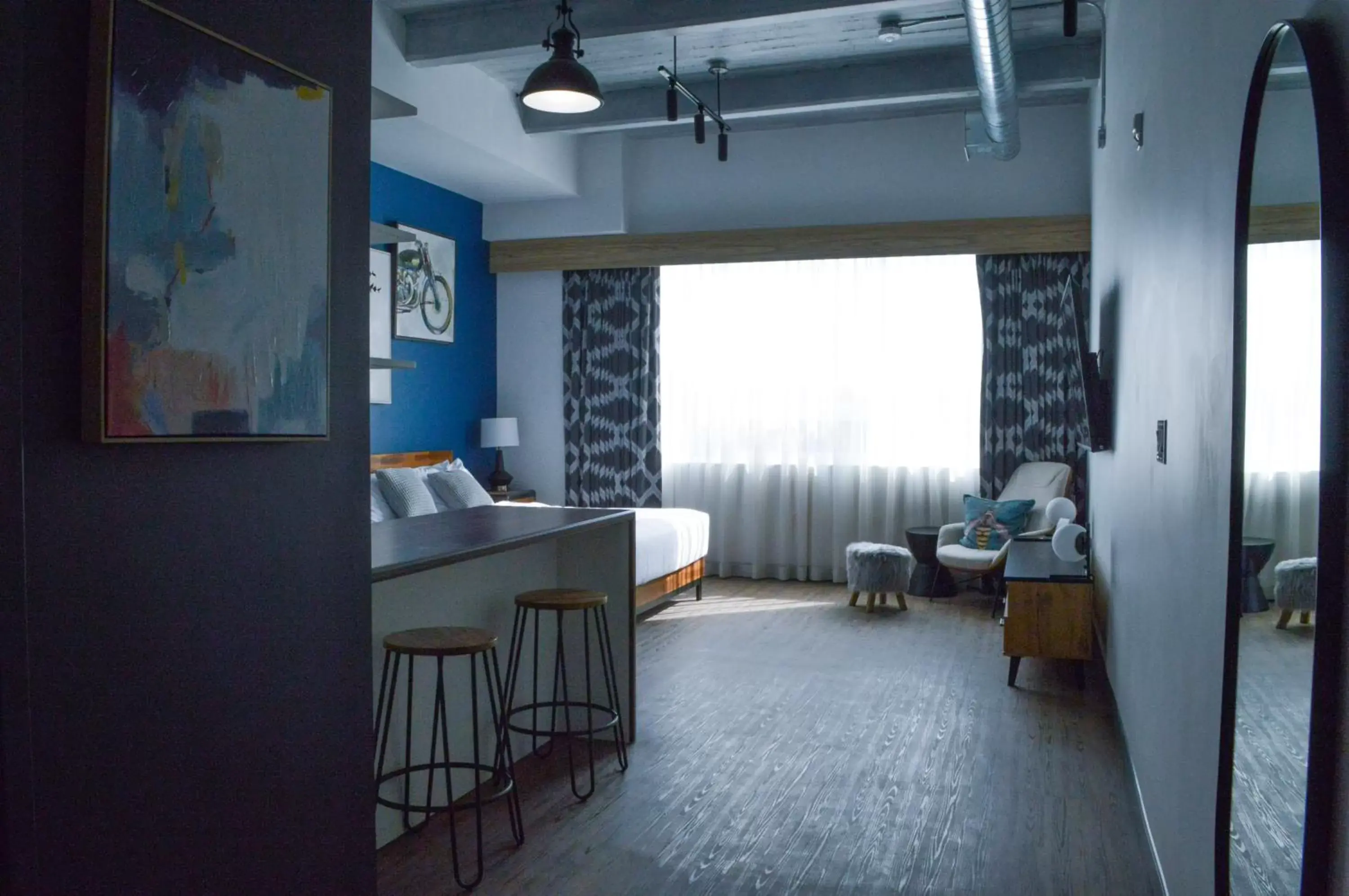 Bed, Seating Area in Cannery Lofts Niagara