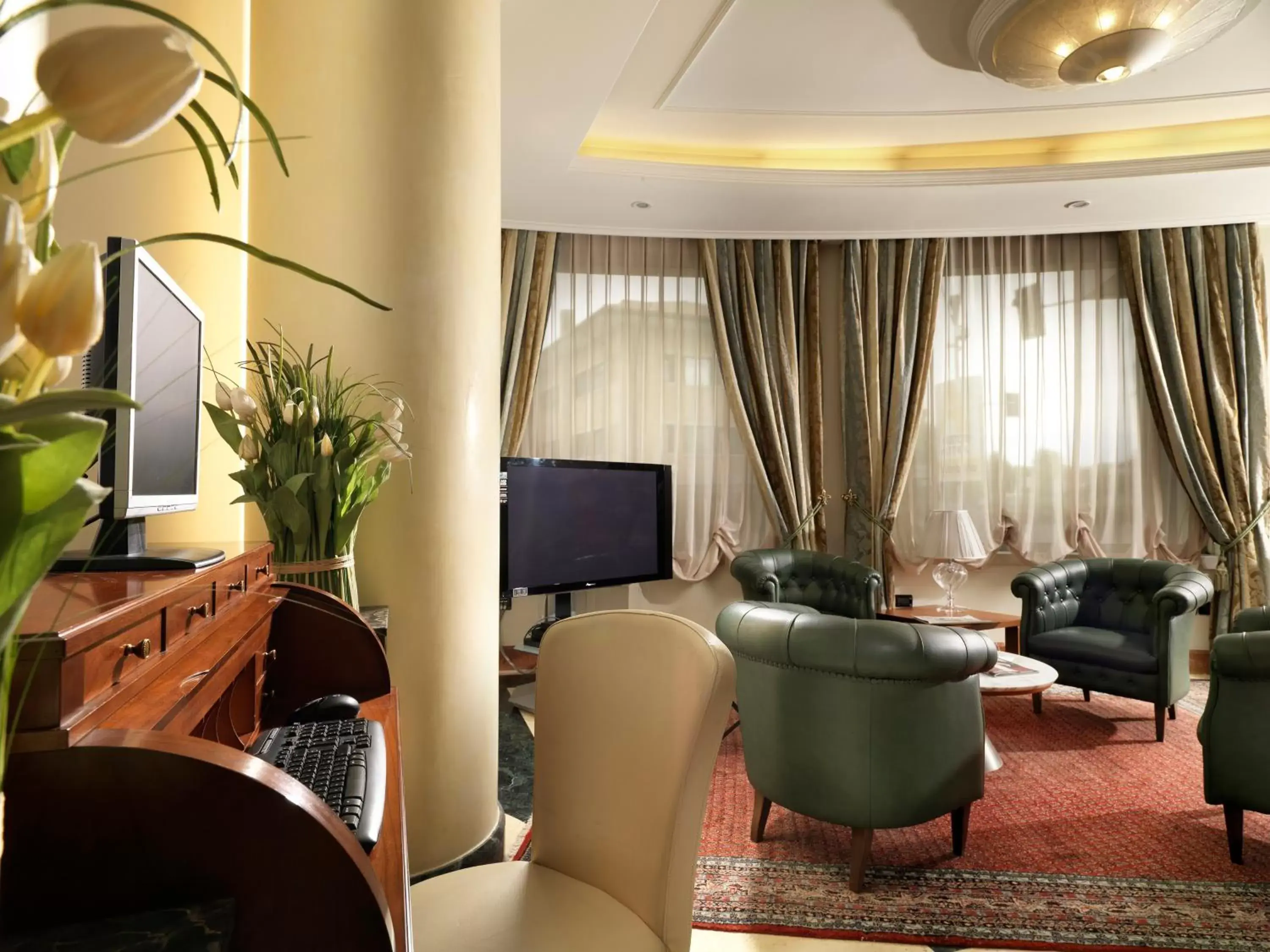 Communal lounge/ TV room, Seating Area in Hotel Ariston