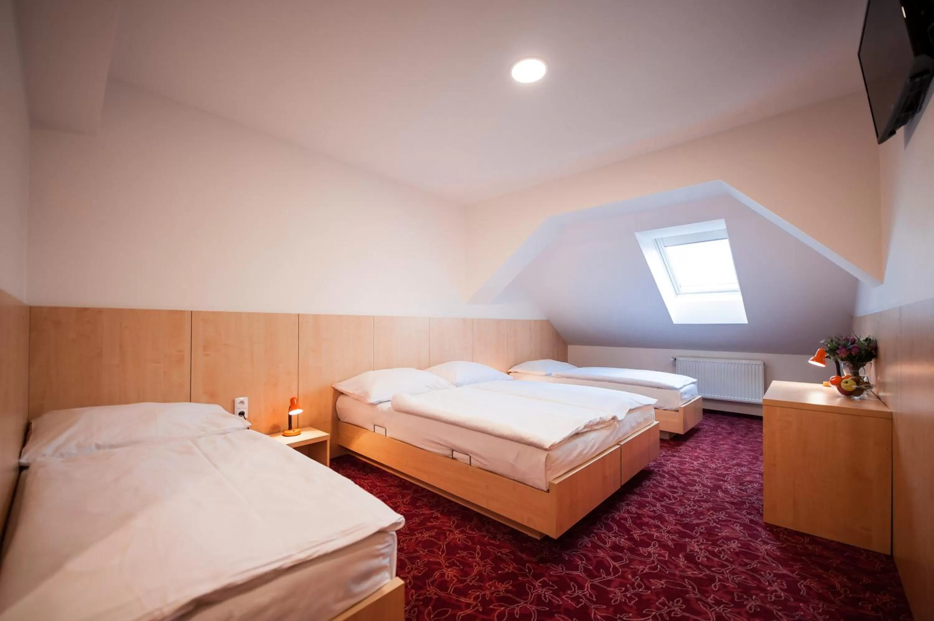 Bed in Hotel Pivovar