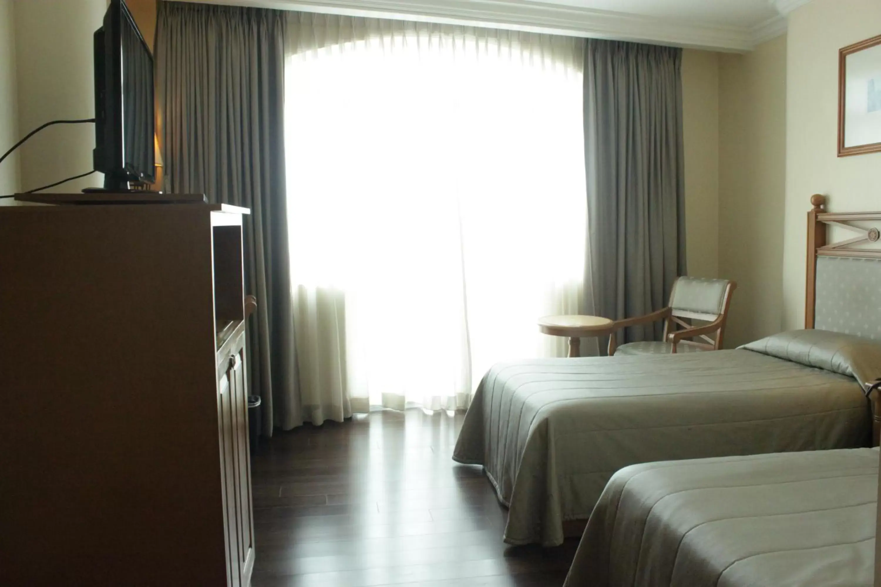 Bed in The Grand Dame Hotel Bed in The Grand Dame Hotel