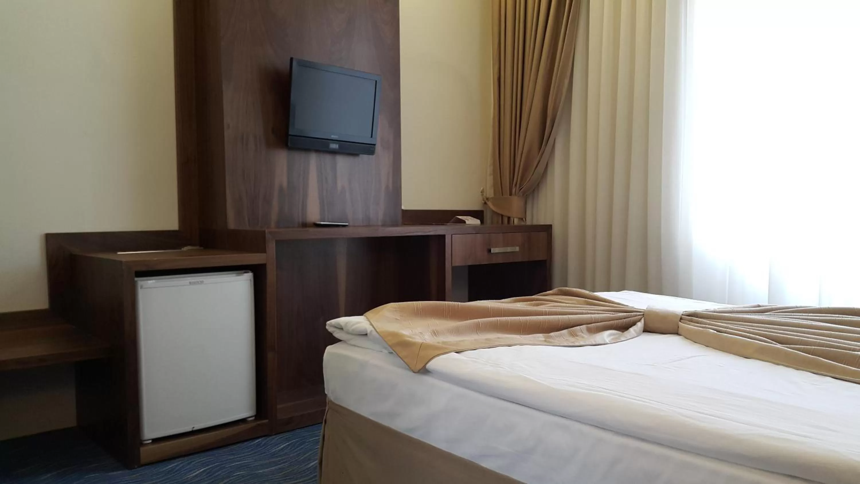 TV and multimedia, Bed in Miroglu Hotel