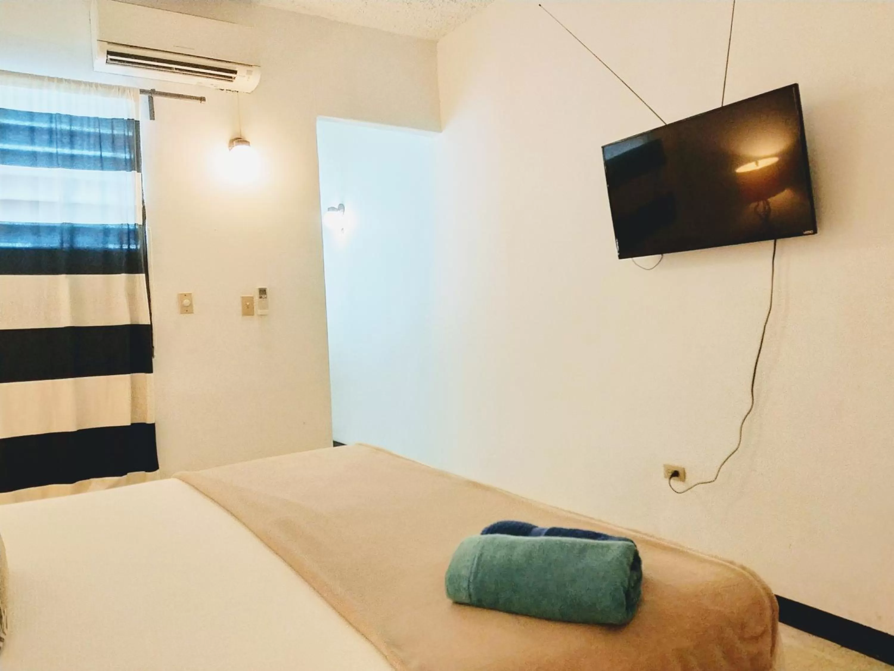 Bed in La Capitana Old San Juan Building