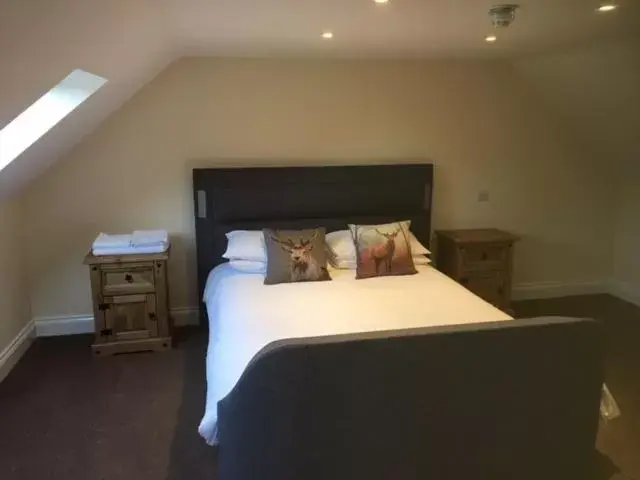 Bed in Oliver Cromwell Hotel