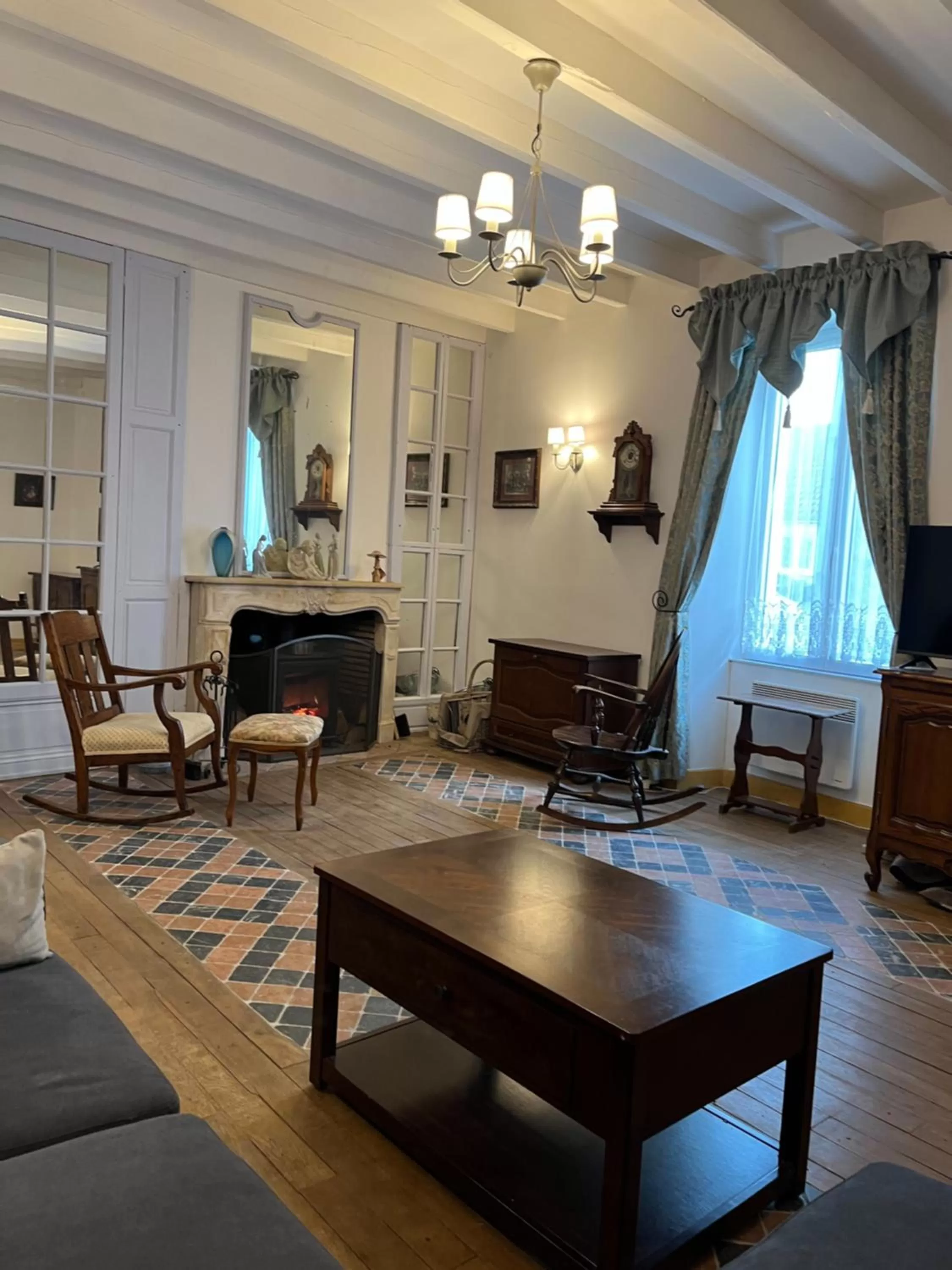 Communal lounge/ TV room, Seating Area in Le Perroquet Vert