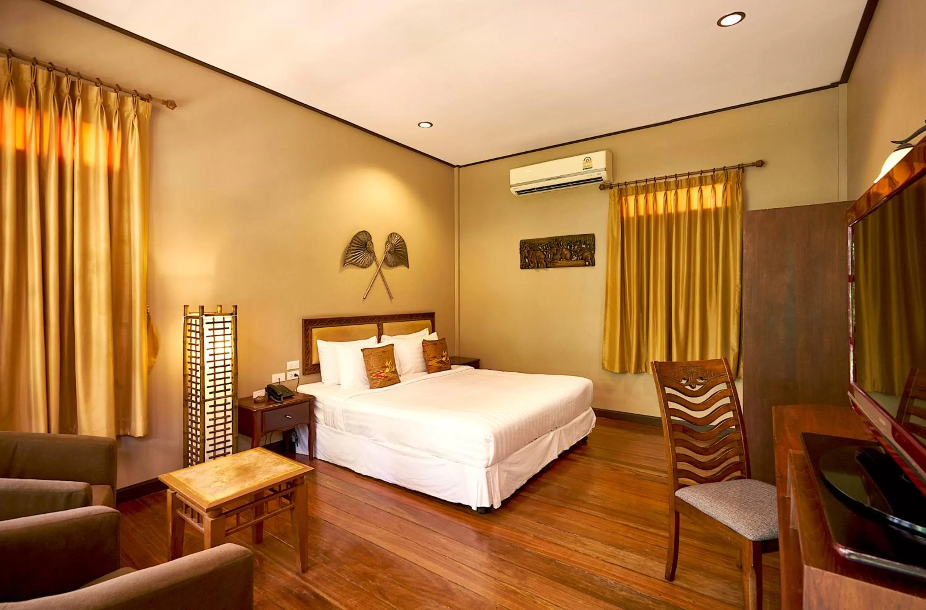 Bed in Ruenkanok Thaihouse Resort