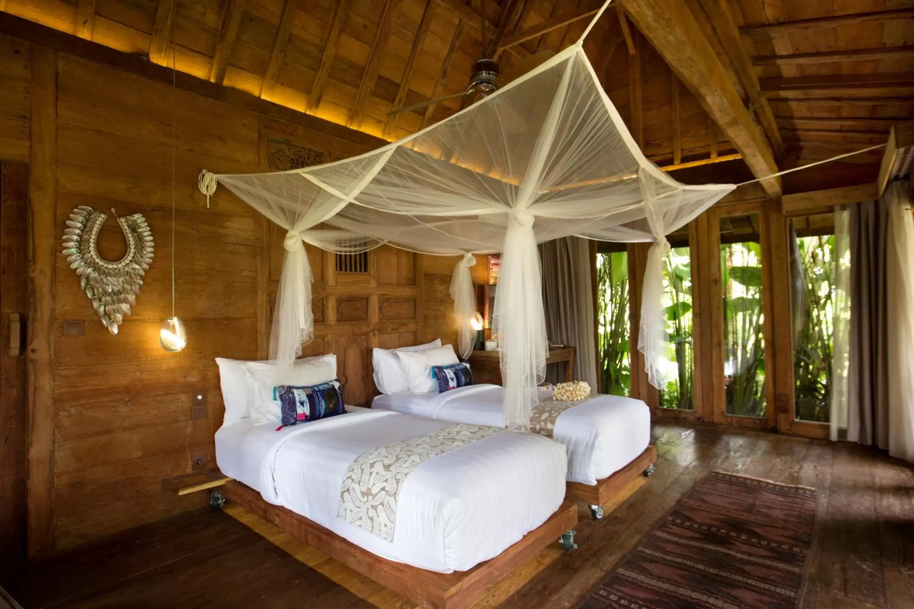 Bed in Blue Karma Dijiwa Ubud