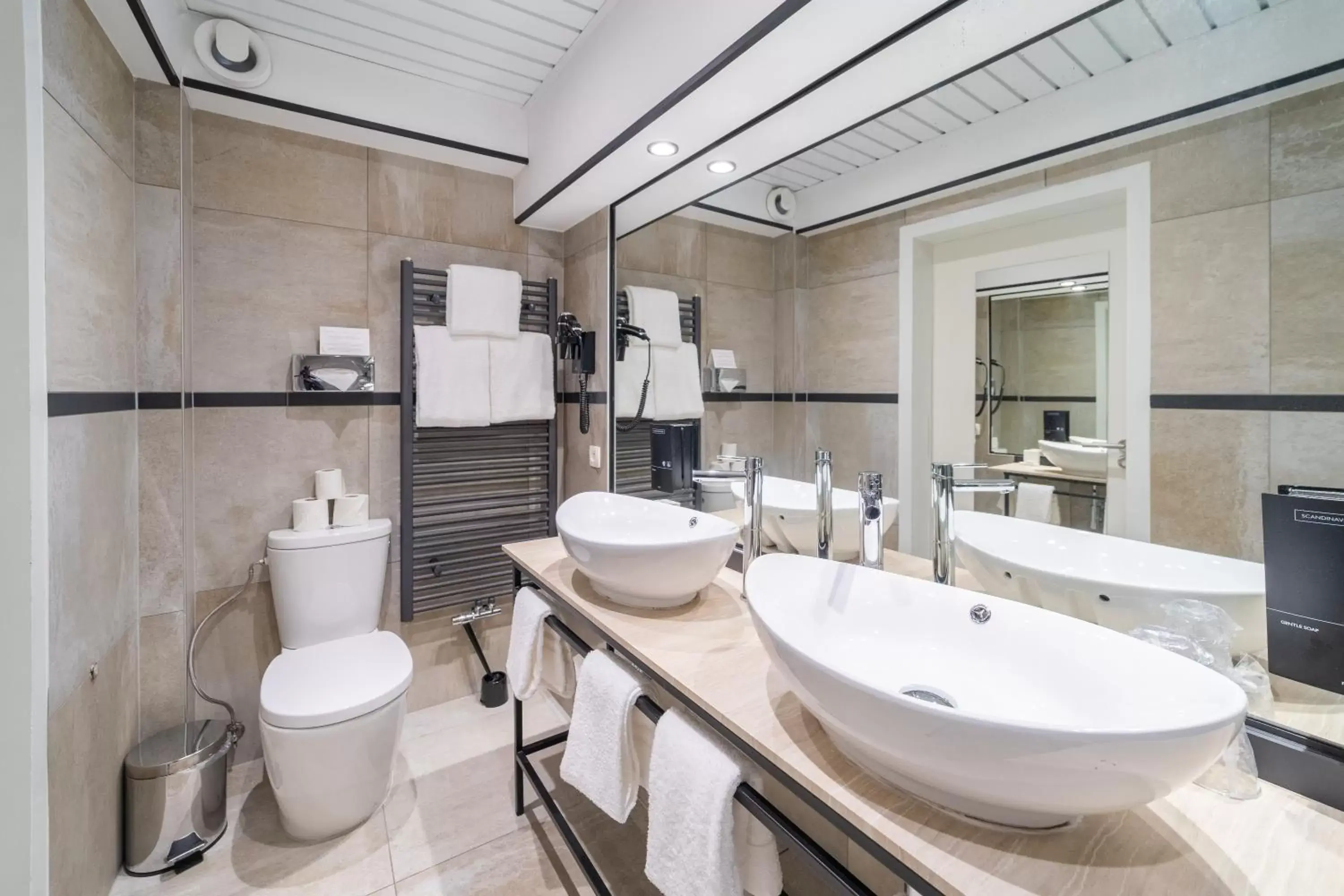 Bathroom in Grand Hotel Normandy by CW Hotel Collection