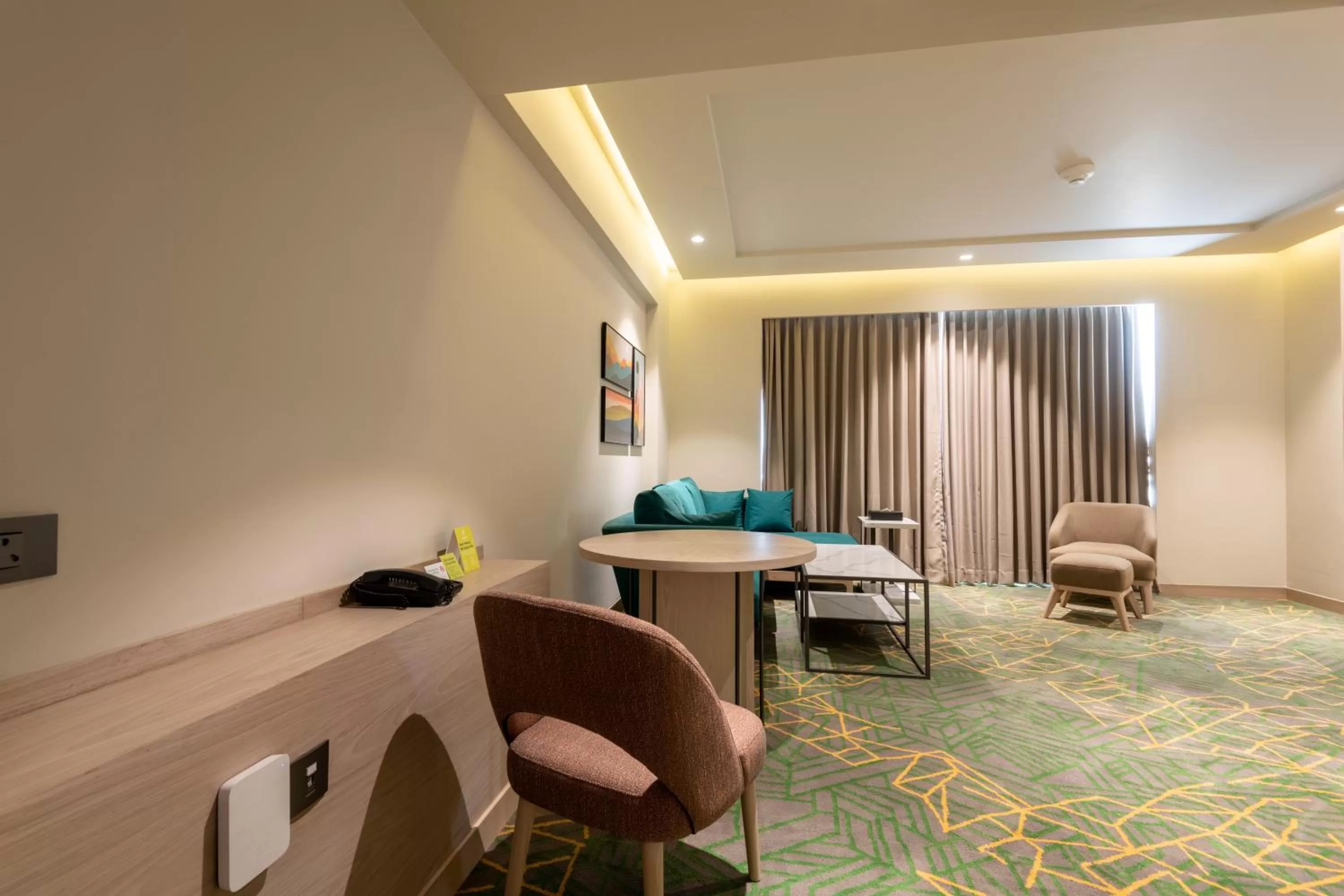 Seating area in Holiday Inn Katra Vaishno Devi by IHG