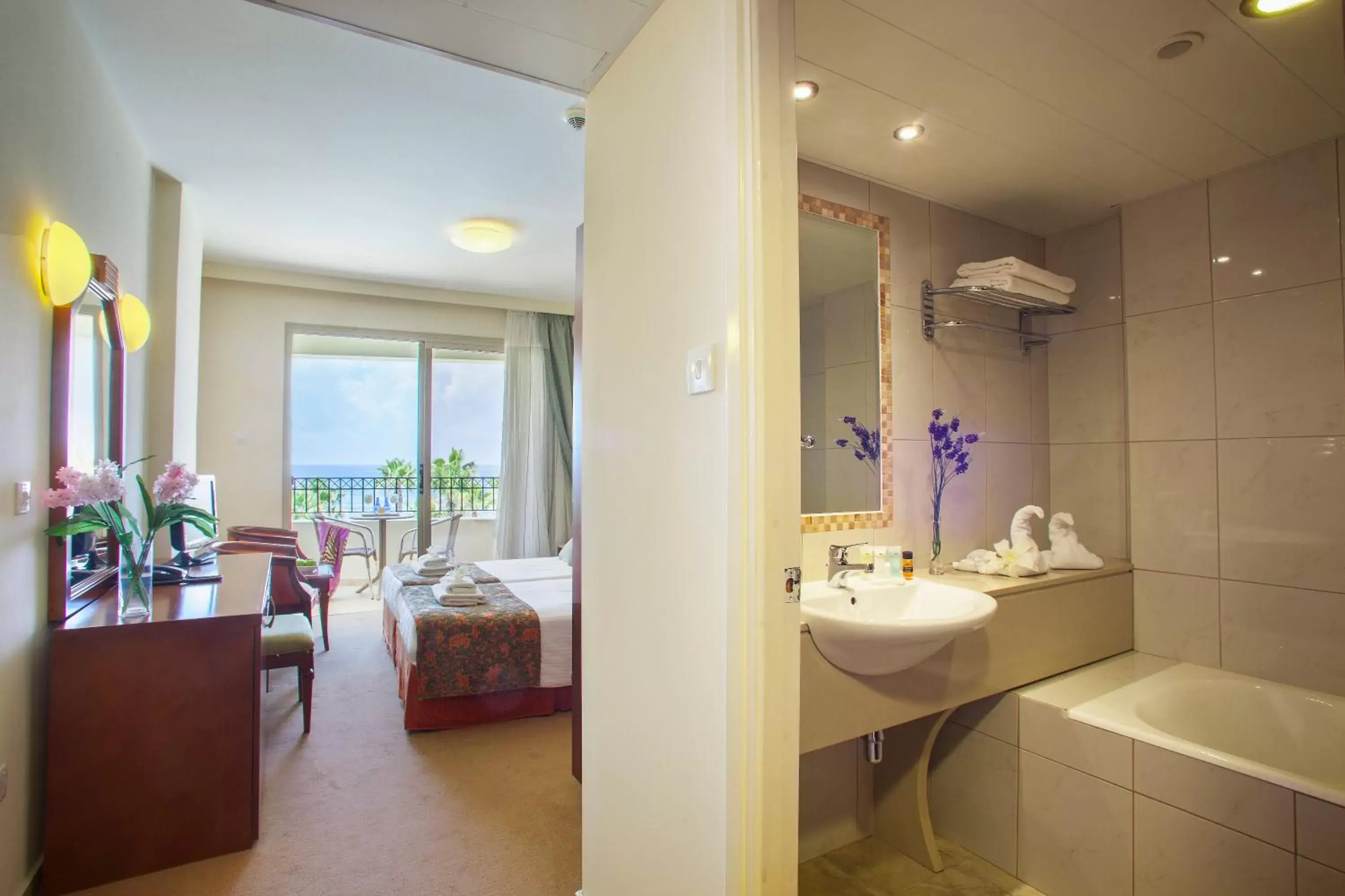 Bedroom, Bathroom in Aquamare Beach Hotel & Spa