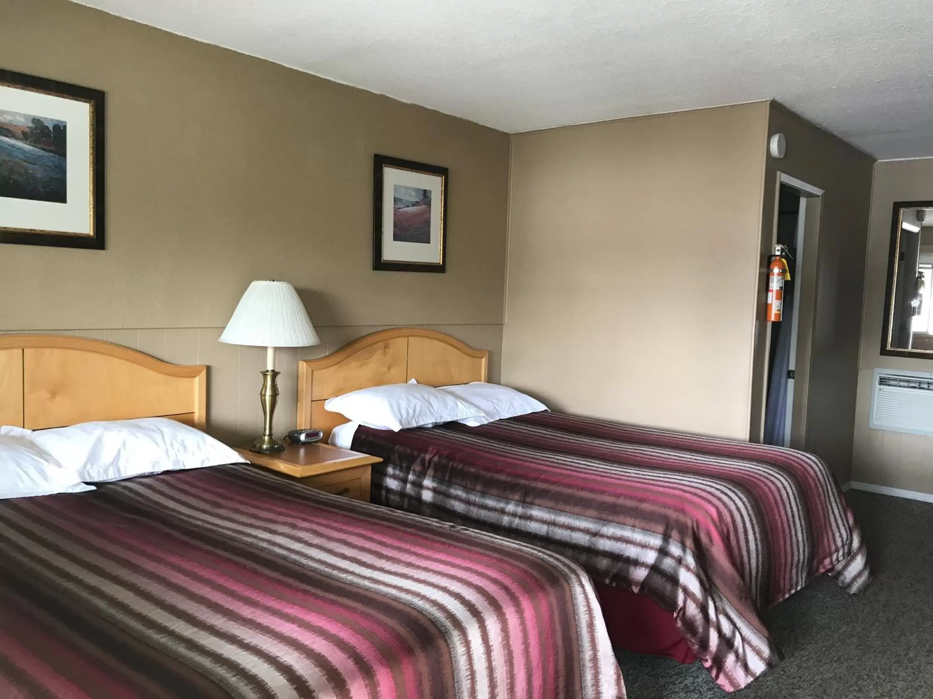 Photo of the whole room, Bed in Bulkley Valley Motel