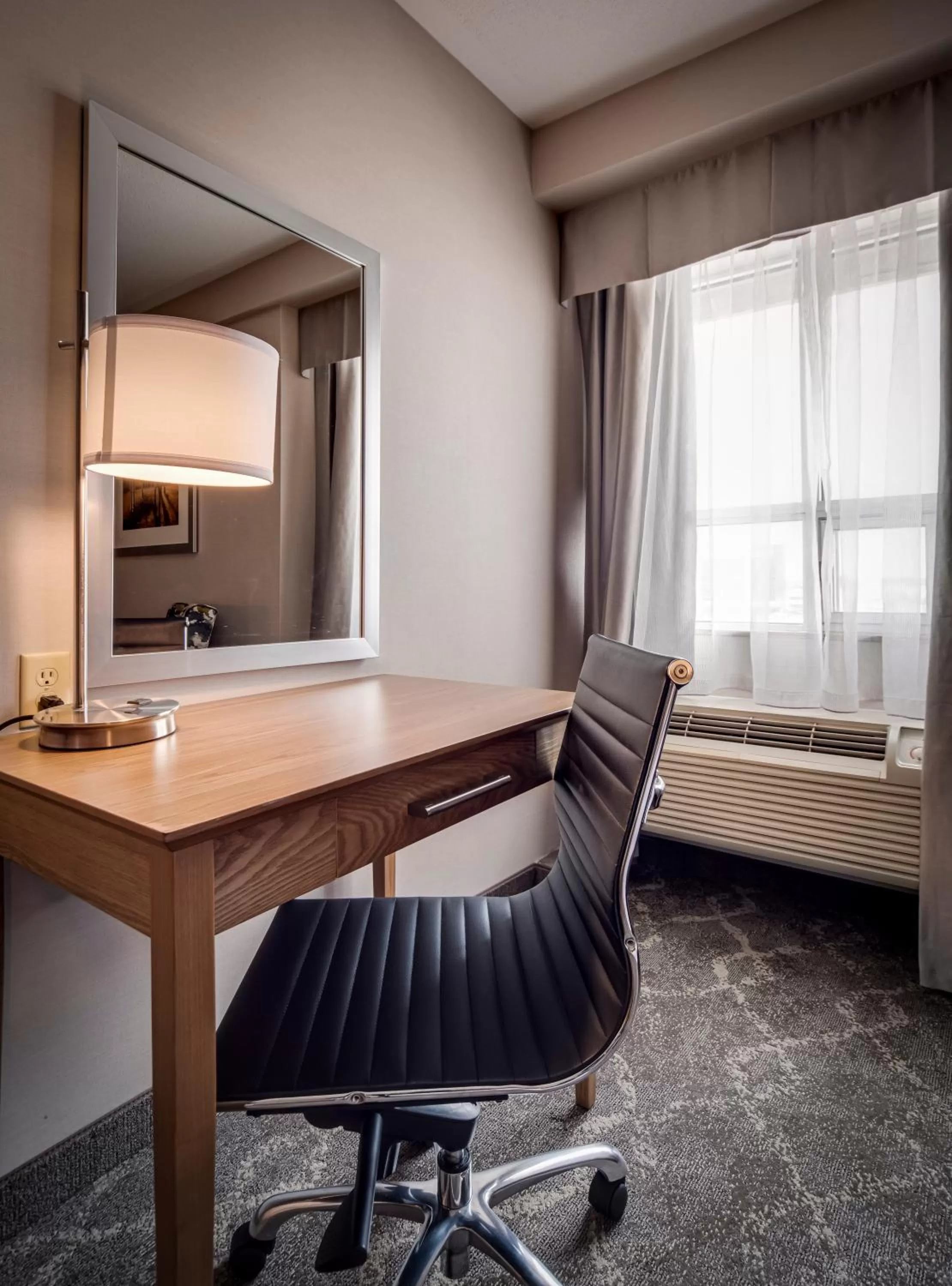 Seating area in Monte Carlo Inn Vaughan Suites