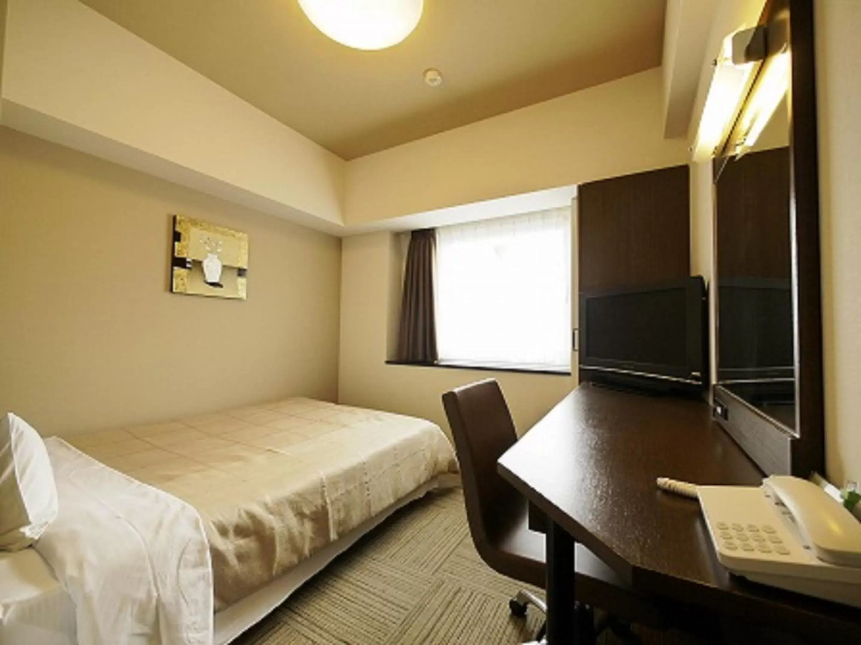 Bed in Hotel Route-Inn Hikone