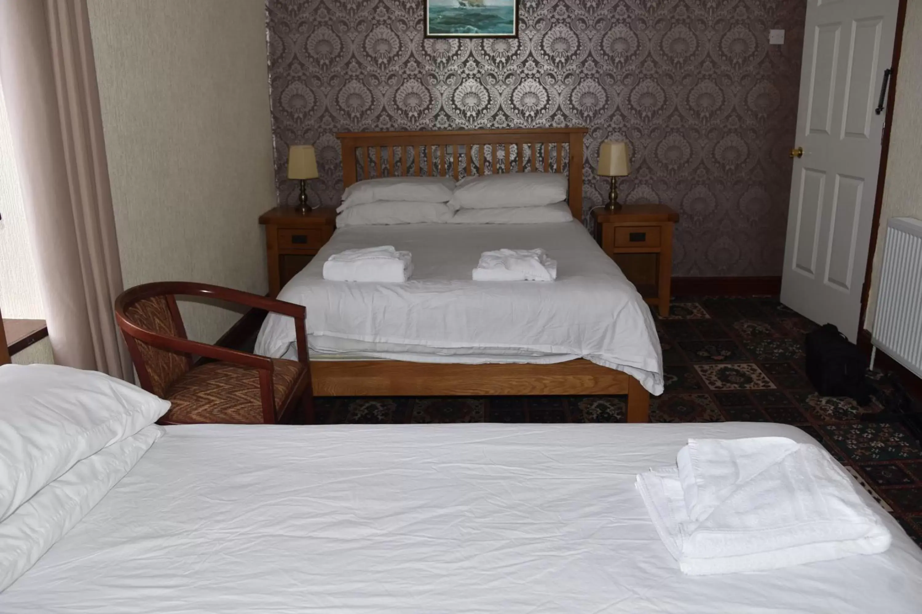 Bed in Dinorben Arms Hotel