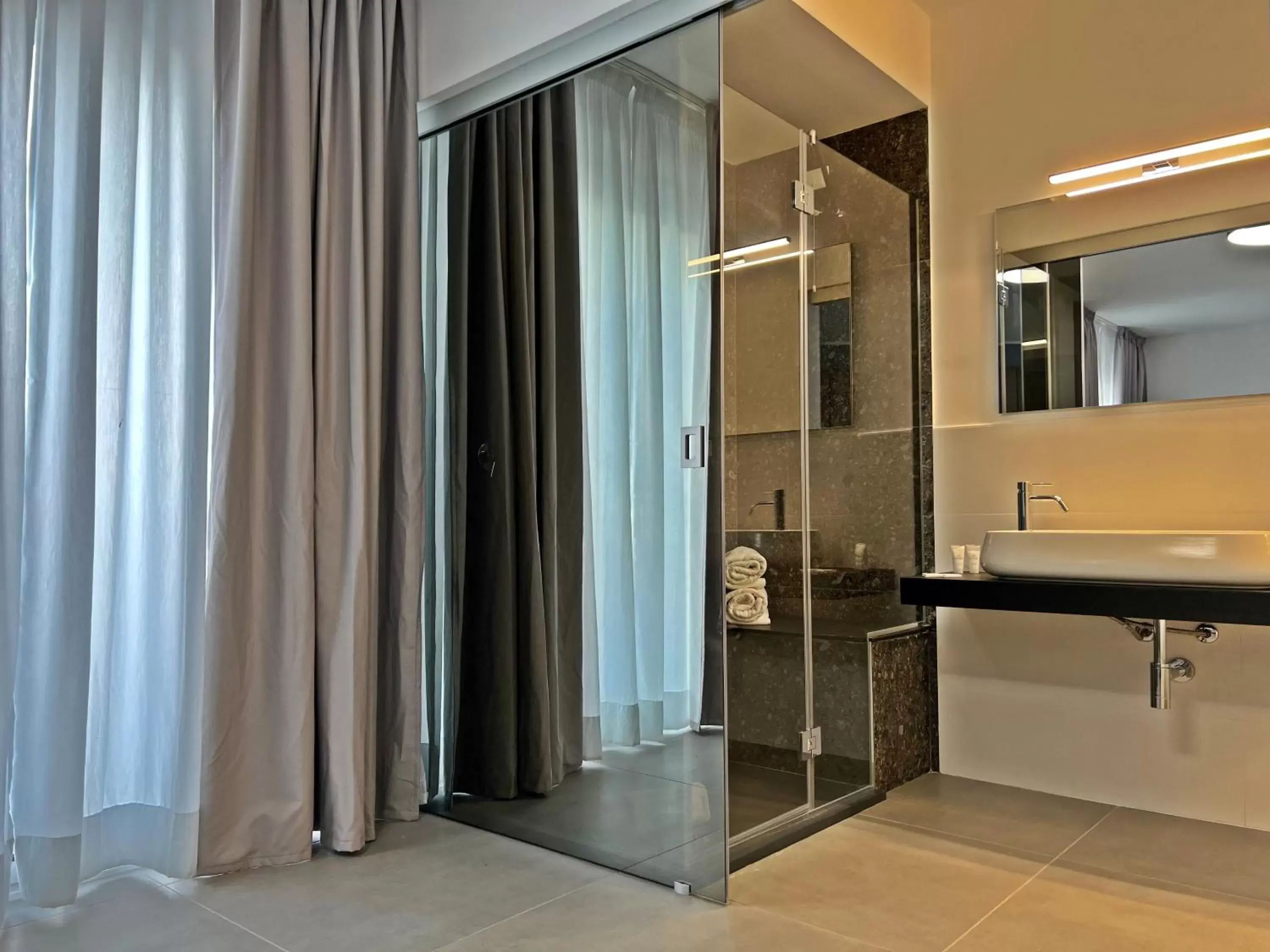 Bathroom in Resort La Battigia Beach & Spa