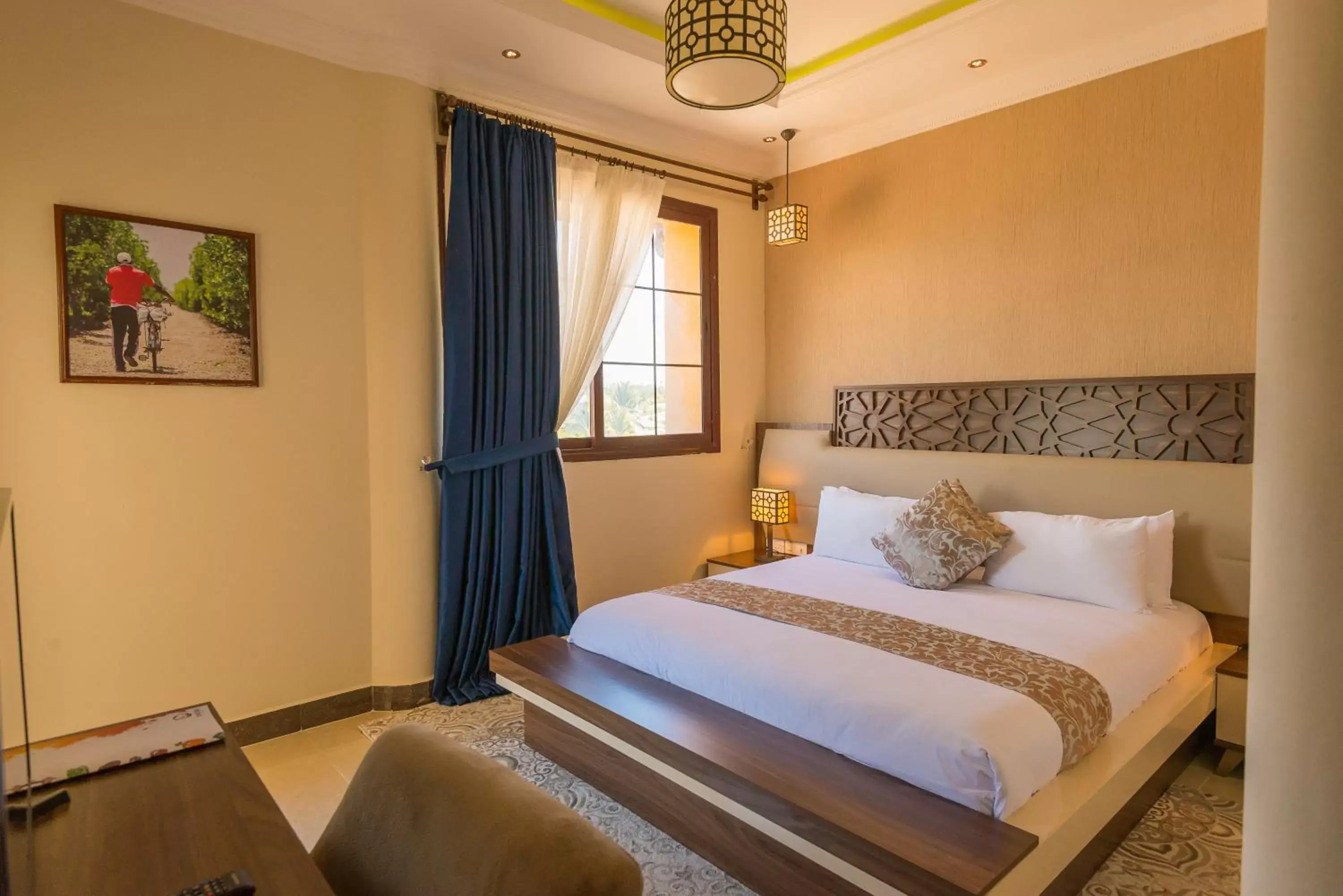 Bed in Golden Tulip Zanzibar Resort