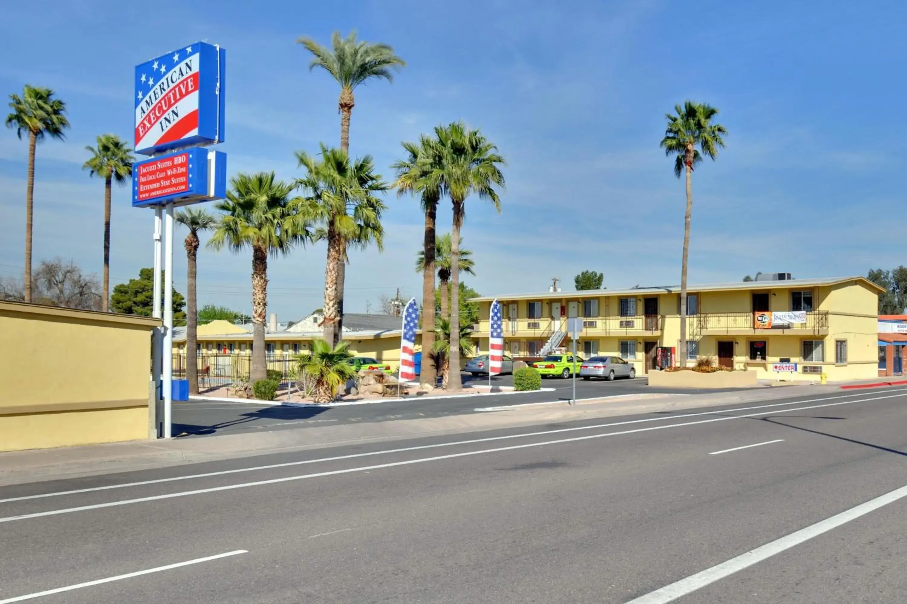 Property logo or sign in American Executive Inn Mesa