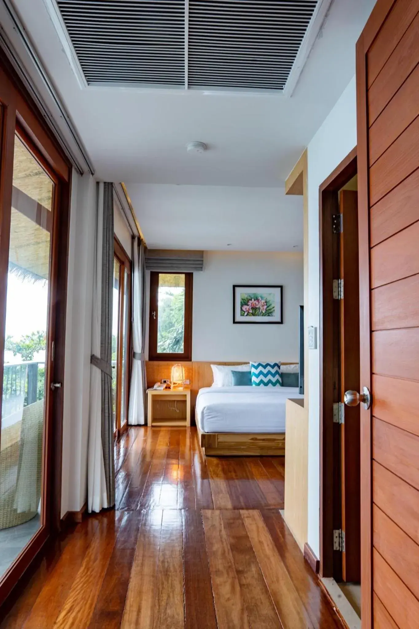 Bedroom in Coral Cliff Beach Resort Samui - SHA Plus