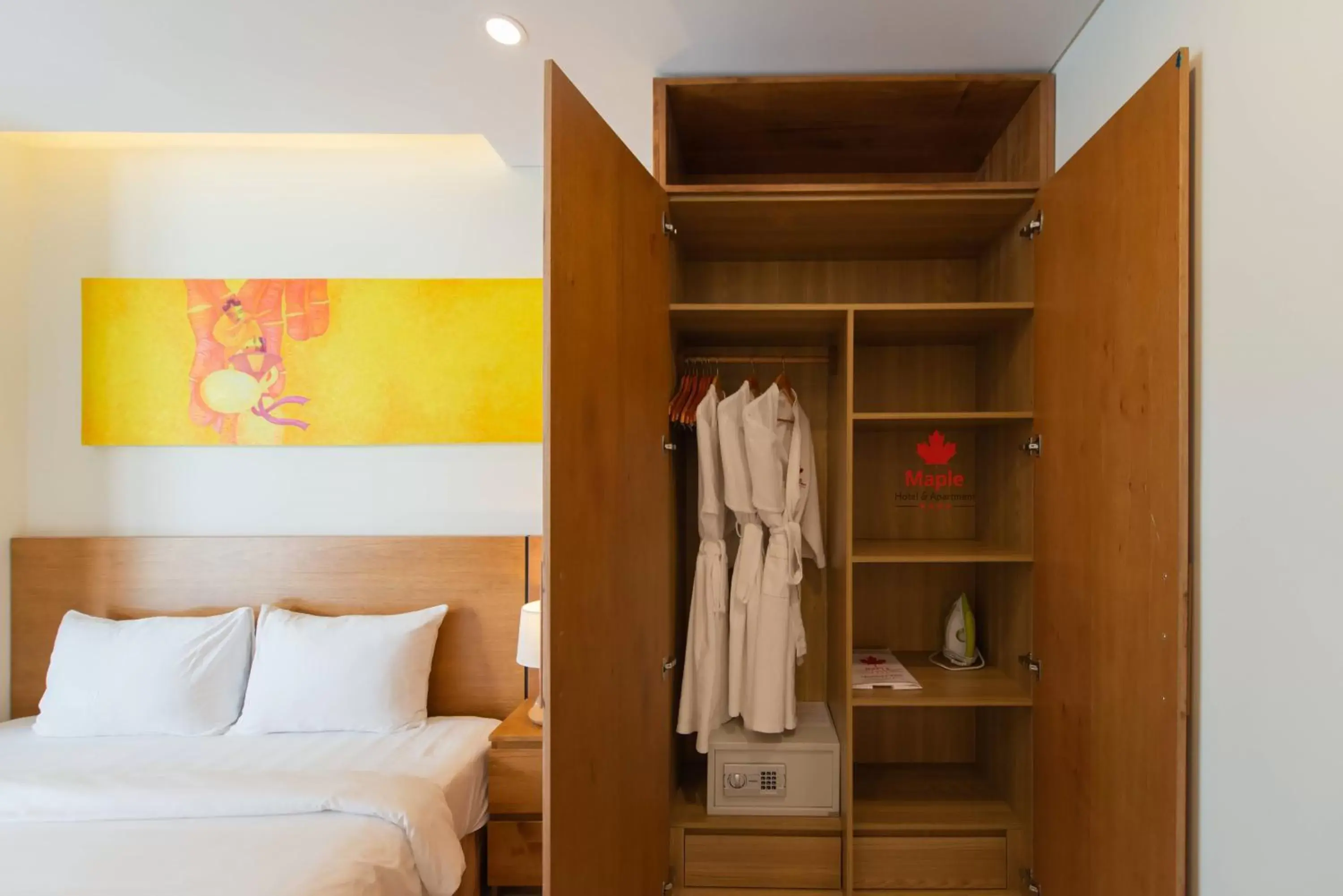 wardrobe, Bed in Maple Hotel & Apartment